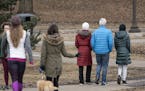 The walking path at Lake of the Isles in Minneapolis was full of people out for fresh air on March 17. The Park Board is urging people to practice soc