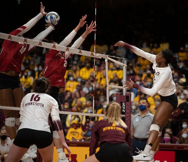 Minnesota Gophers Stephanie Samedy (10) goes for against the Wisconsin Badgers in Minneapolis, Minn., on Sunday, Nov. 21, 2021. Gophers volleyball vs.