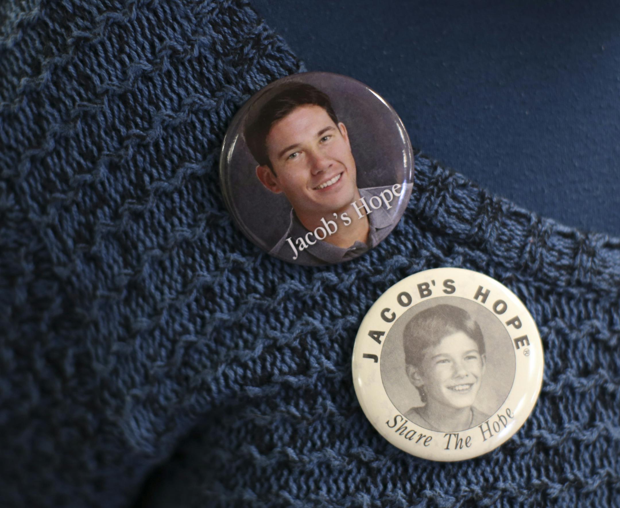 At the open house Tuesday afternoon, Jacob Wetterling's aunt, Peg Overturf, wore a vintage "Jacob's Hope" button along with one where Jacob's image has been "age progressed" to what he might look like at about age 35. ] JEFF WHEELER ï jeff.wheeler@startribune.com On Jacob Wetterling's 37th birthday, Tuesday, February 17, 2015, his mother and father, Patty and Jerry Wetterling, attended an open house and spoke at the Jacob Wetterling Resource Center to commemorate the organization's 25th ann