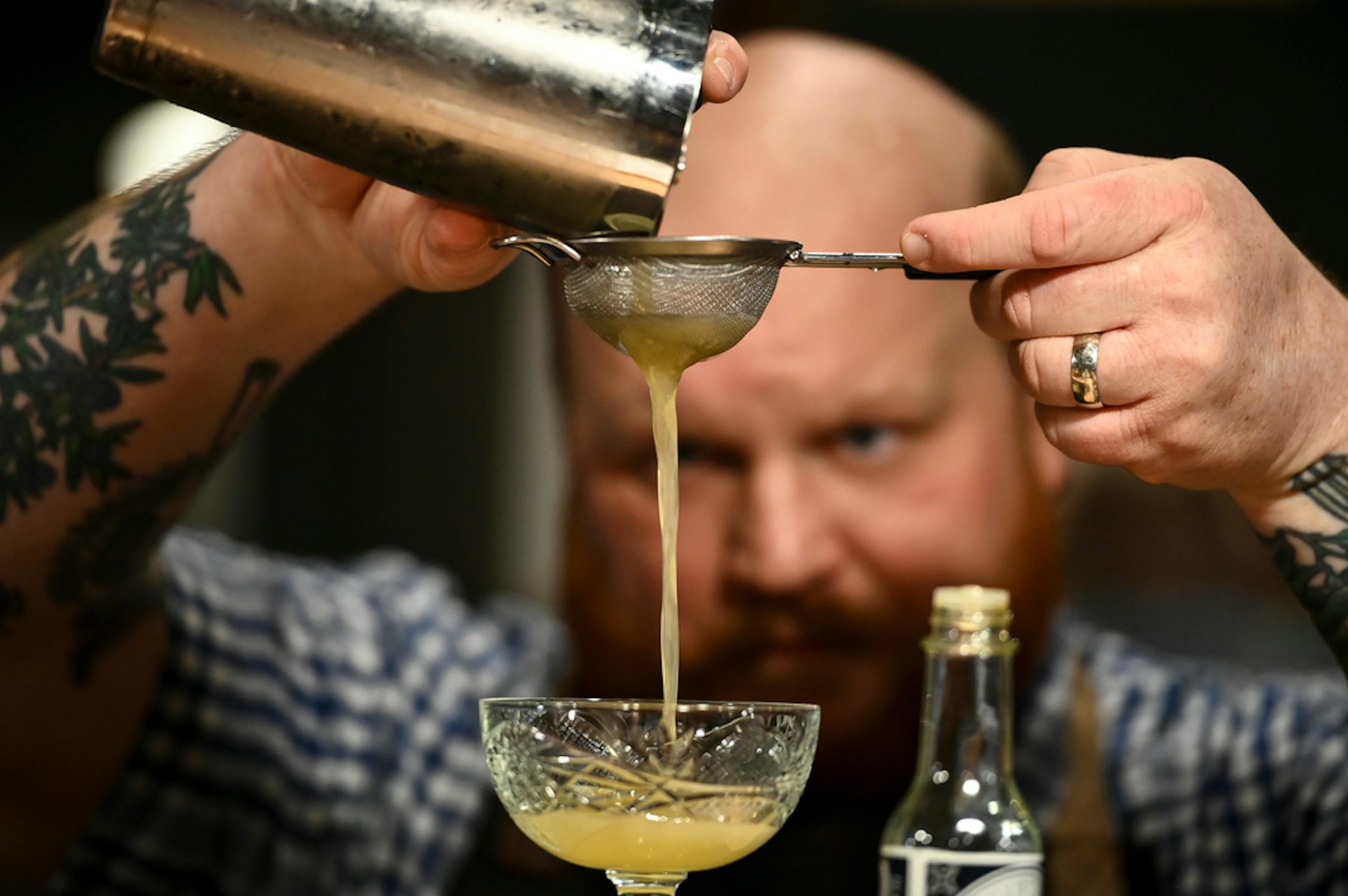 Nick Kosevich of Bittercube Bitters demonstrated how to double-strain a cocktail to rid it of ice during a class.