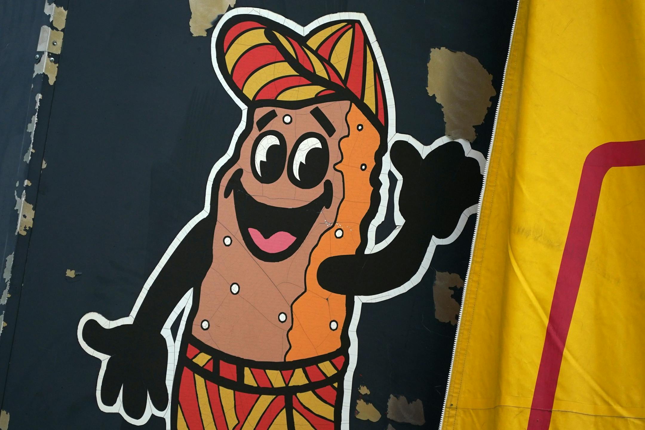 The Fresh French Fry mascot stood over the State Fairgrounds Thursday.