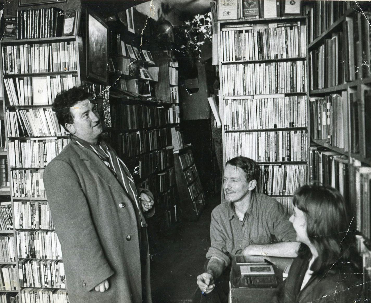 Irish author Brendan Behan, left, at Shakespeare and Co. in the mid-1950s.