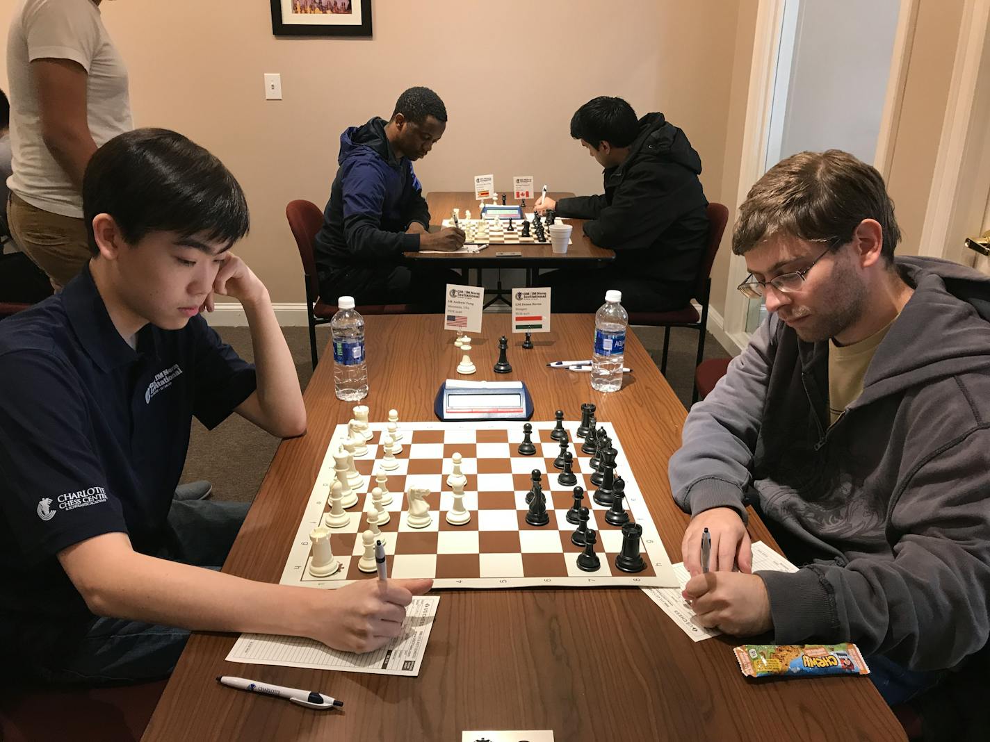 Andrew Tang, left, a Wayzata High School senior, defeated Grandmaster Denes Boros, right, at a tournament in Charlotte, N.C., a victory that helped Tang earn the grandmaster title himself.