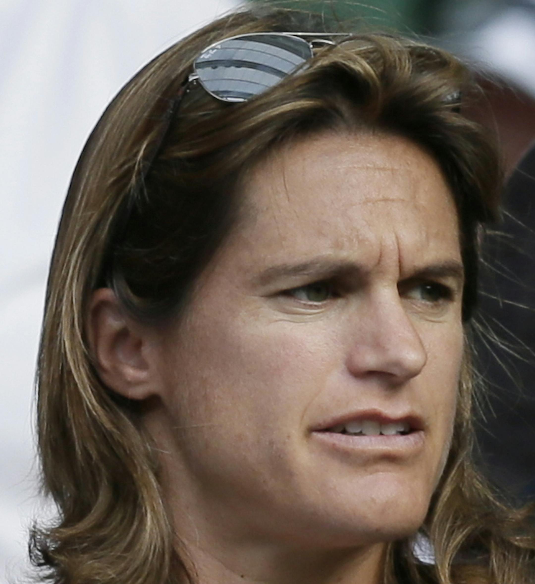 Amelie Mauresmo, coach of Andy Murray of Britain, arrives to watch the singles match between Murray and Andreas Seppi of Italy at the All England Lawn Tennis Championships in Wimbledon, London, Saturday July 4, 2015. (AP Photo/Tim Ireland) ORG XMIT: MIN2015071818095233