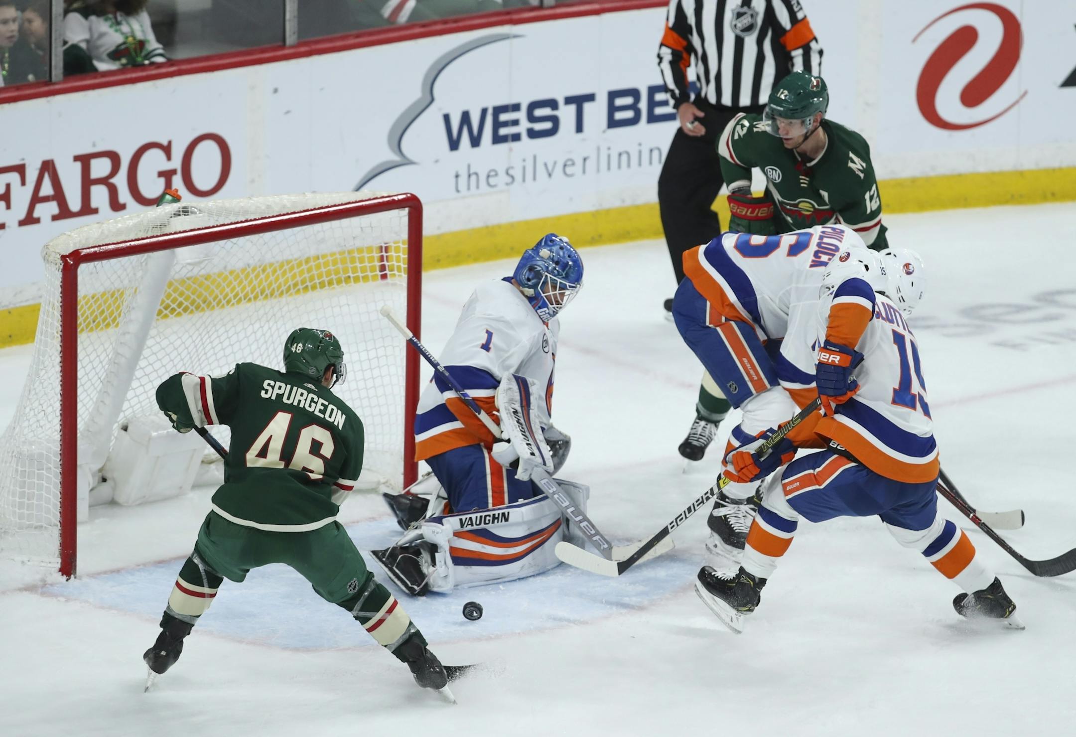 Minnesota Wild defenseman Jared Spurgeon (46) tied the game at 2-2 in the third period when he buried the rebound of a puck shot by teammate Eric Staal (12) on an out of position New York Islanders goaltender Thomas Greiss.