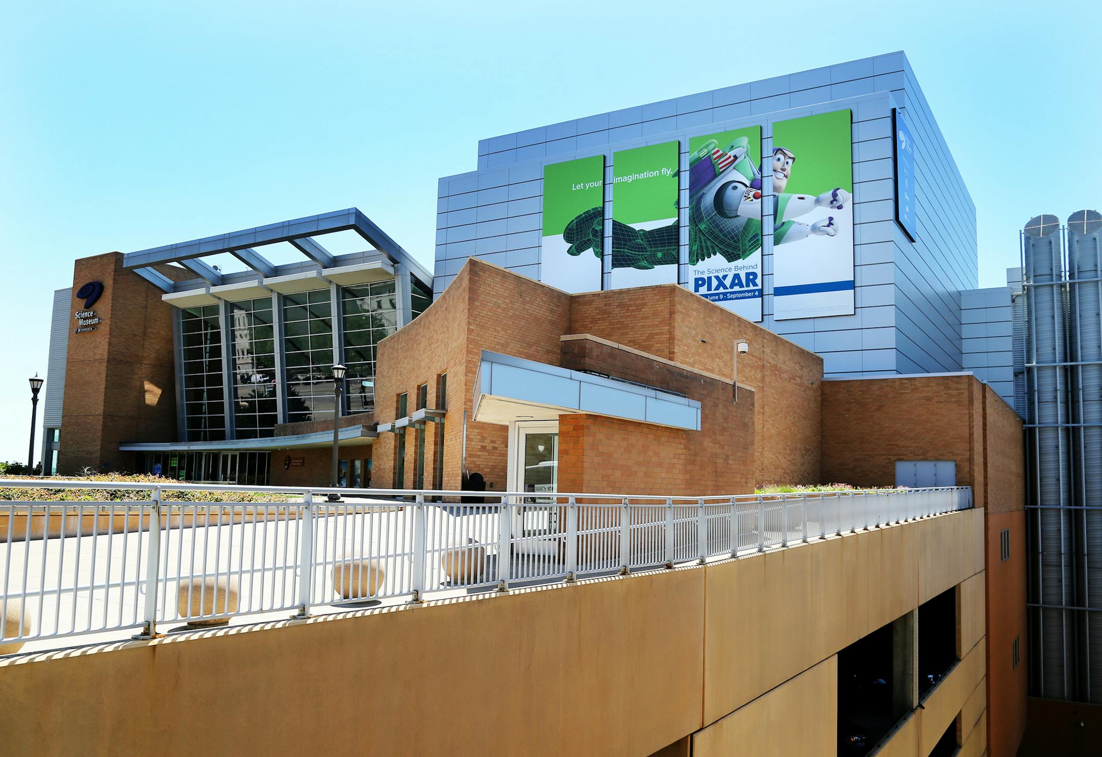 Giant panels of Buzz Lightyear from Toy Story fame announces the Science Behind Pixar exhibit that's opening Friday, June 9 at the Science Museum of Minnesota and seen Thursday, June 1, 2017, in St. Paul, MN.] DAVID JOLES ï david.joles@startribune.com Science Behind Pixar exhibit that's opening at the Science Museum of Minnesota ORG XMIT: MIN1706011514341786