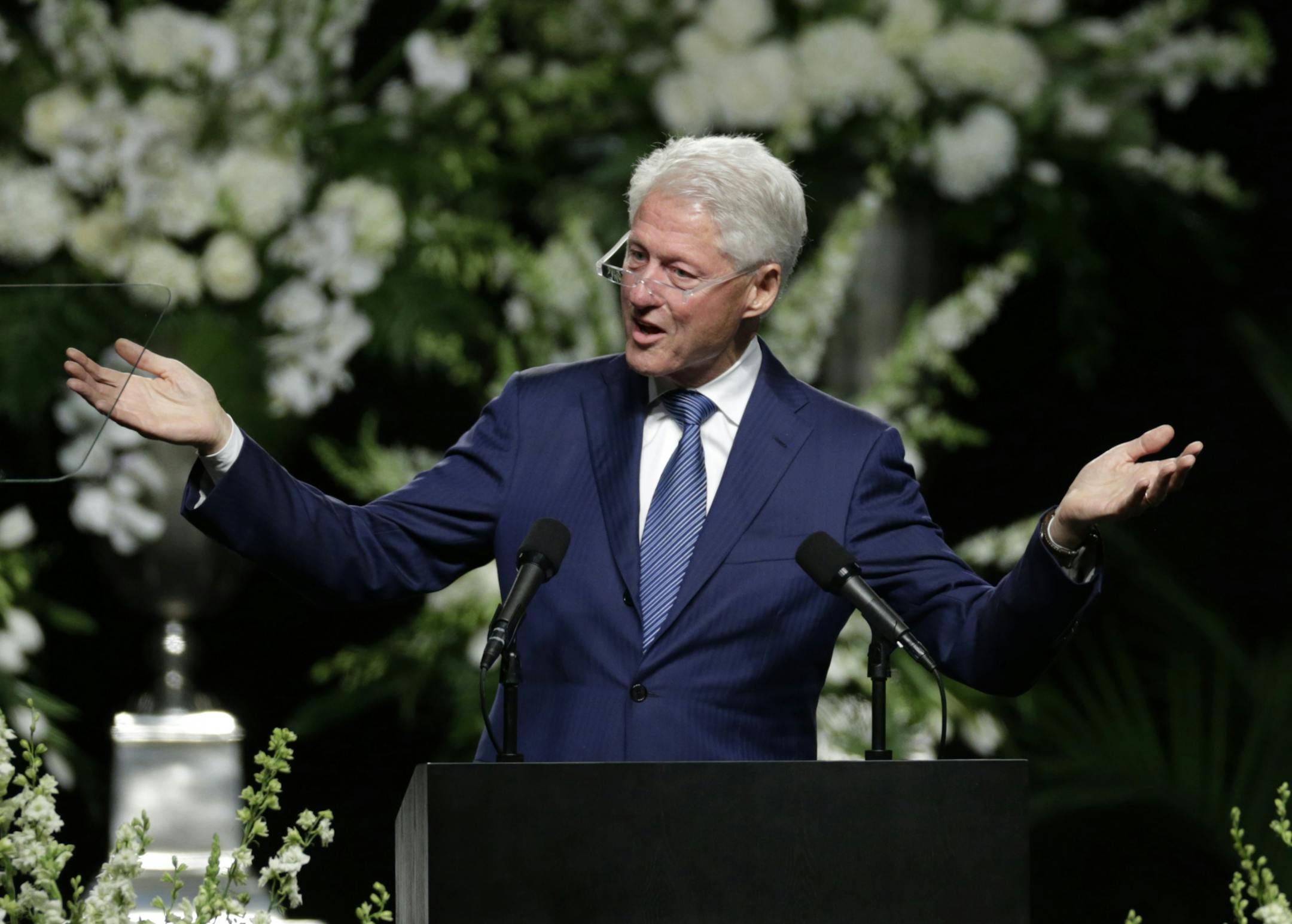 Former President Bill Clinton delivers a eulogy during Muhammad Ali's memorial service, Friday, June 10, 2016, in Louisville, Ky.