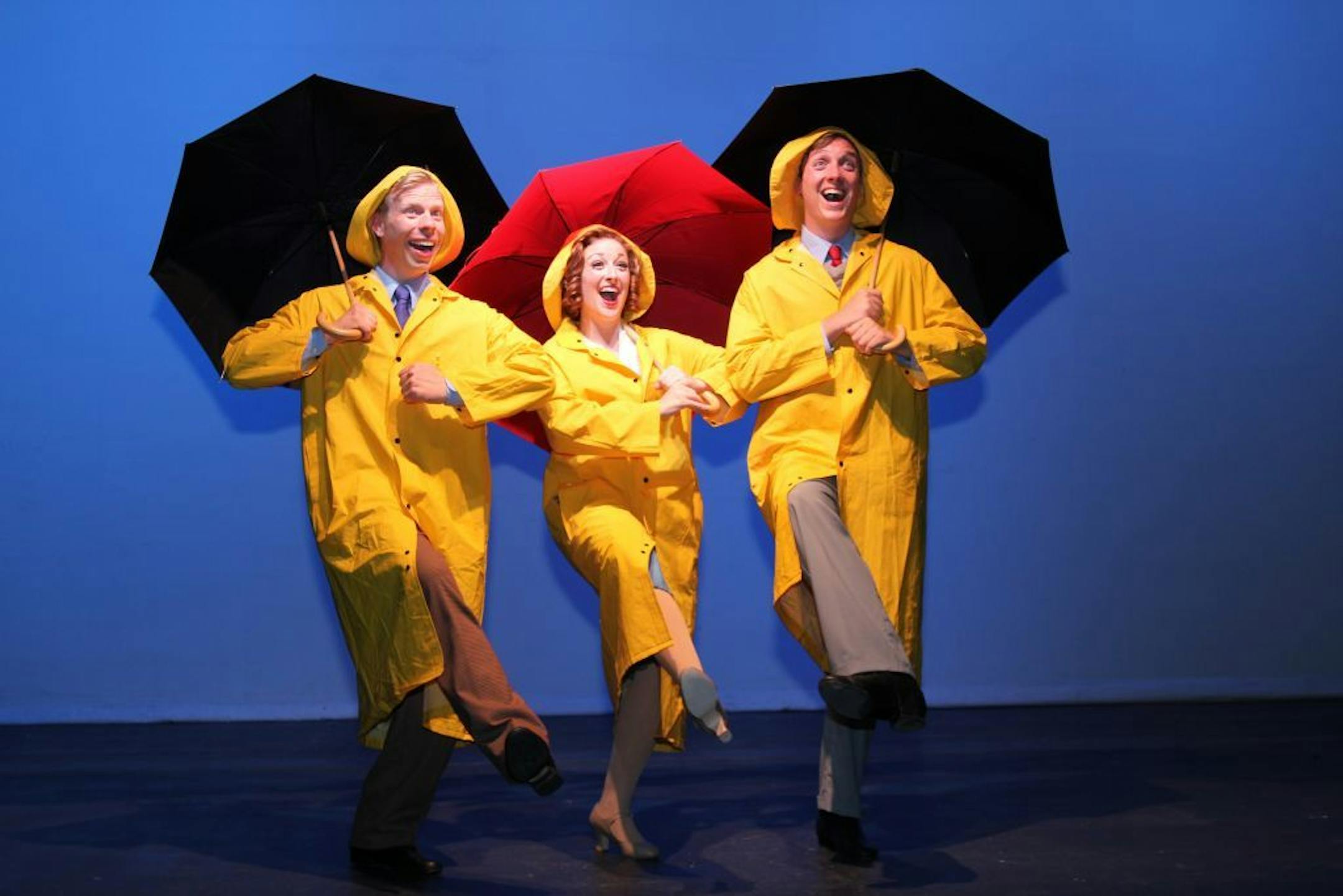 Jeffery C. Nelson as Cosmo Brown, Holli Richgels as Kathy Seldon and C. Ryan Shipley as Don Lockwood in "Singin� In The Rain."
