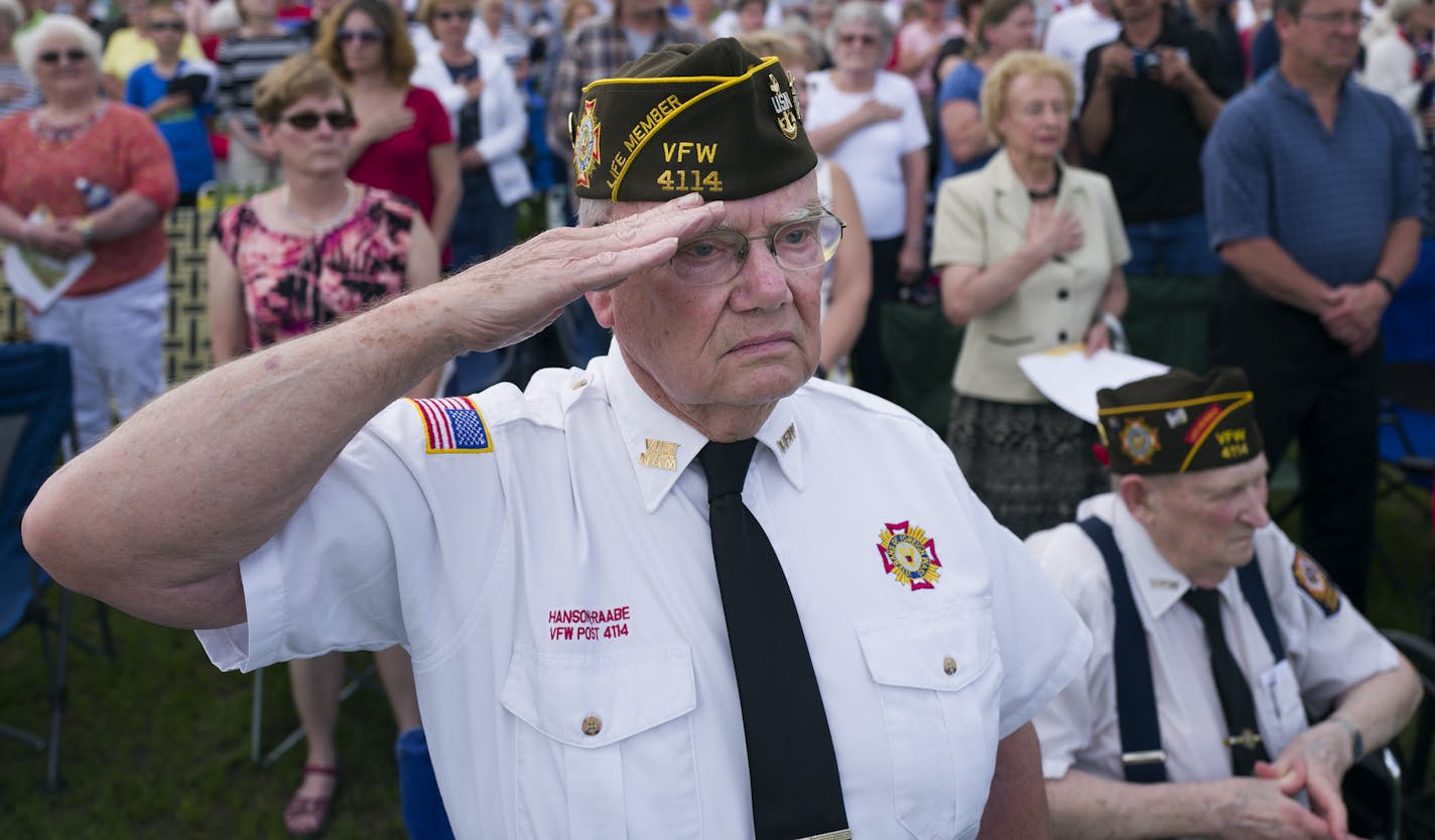 Minnesota Navy veteran Roger Tangen Vietnam saluted as the flags were posted at the MN State Vets Cemetery Preston Sunday May 29 2016 in Preston, MN.] The Minnesota Department of VA is hosting a dedication event at the new Minnesota State Veterans Cemetery in Preston, MN. Jerry Holt /Jerry.Holt@Startribune.com