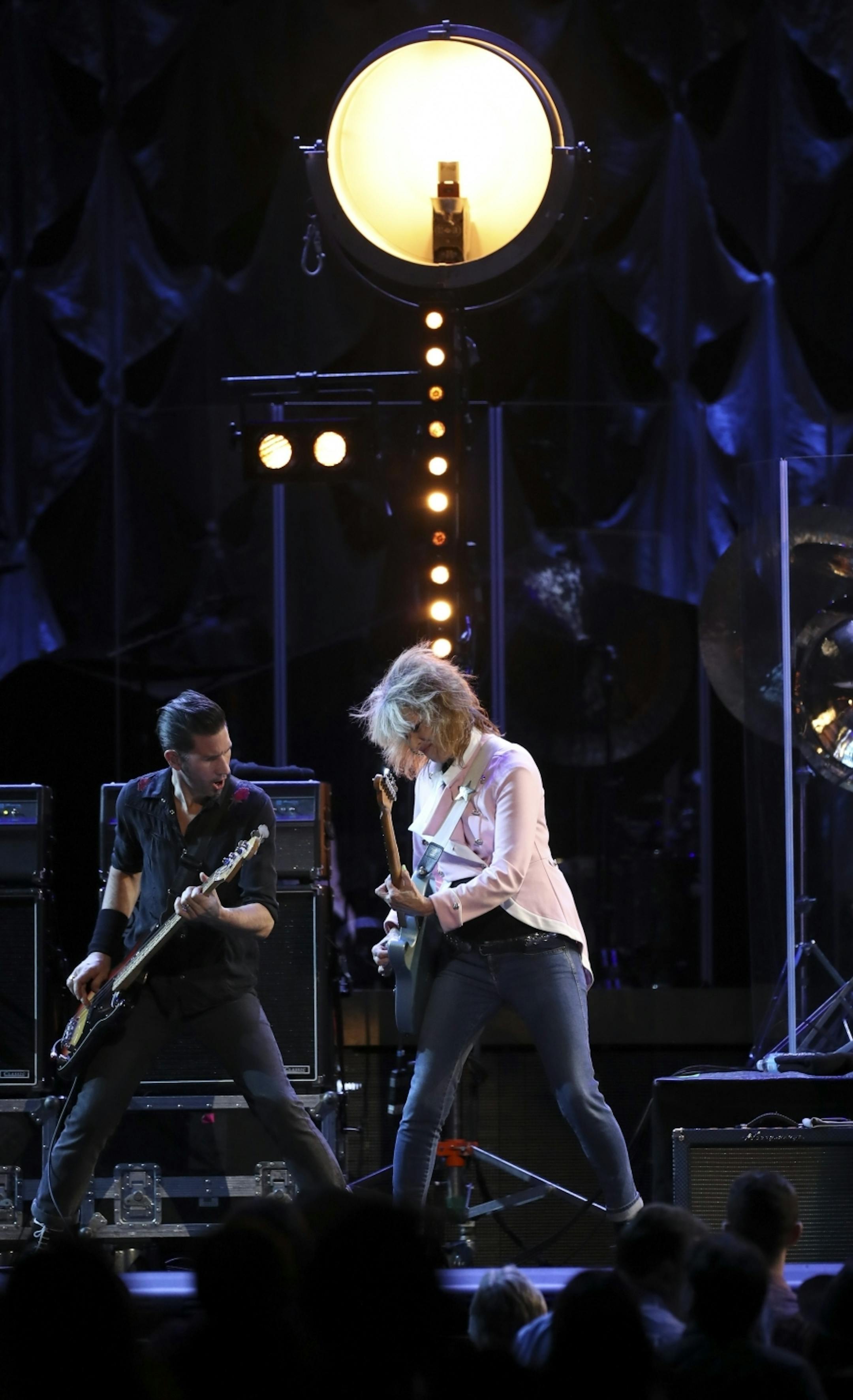 Chrissie Hynde with bassist Nick Wilkinson during the Pretenders set Tuesday night at Xcel Energy Center.