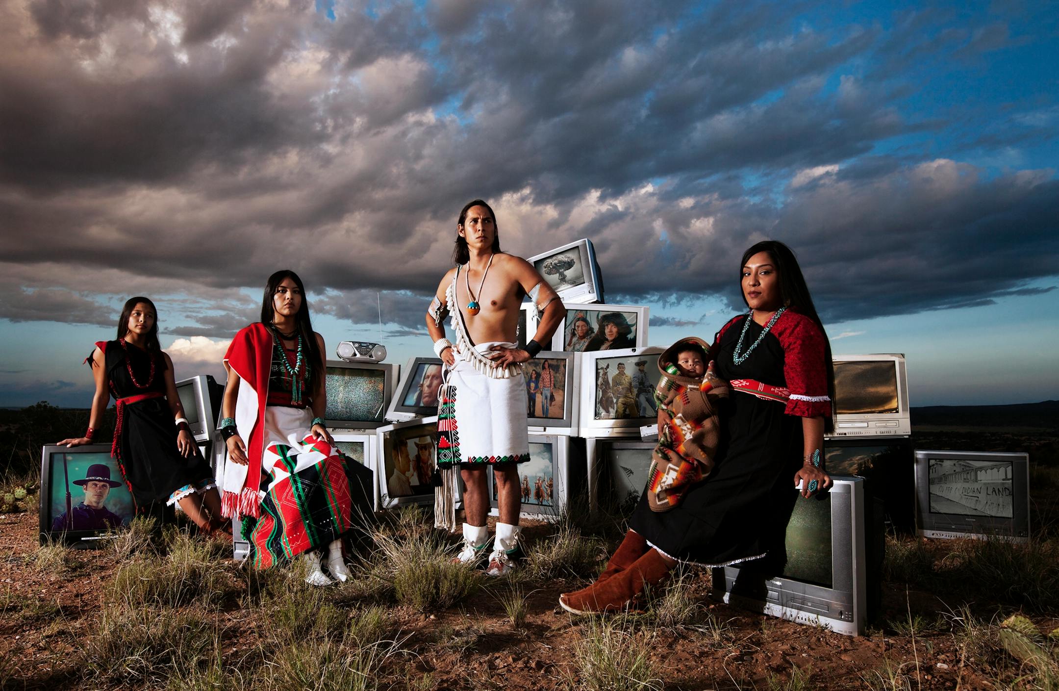 Cara Romero. Chemehuevi, born 1977. TV Indians, 2017. Archival inkjet print. 46 ' 64 1/8 in. Courtesy of the artist.