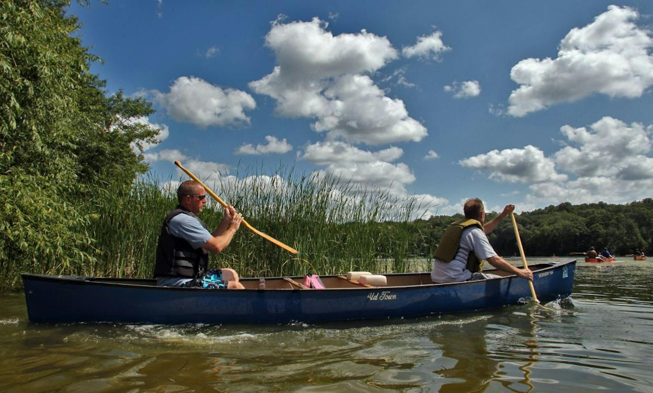 Lebanon Hills Regional Park in Eagan has a dozen lakes and ponds and offers rental canoes, kayaks and paddle boards that you can paddle and portage through 7 of the lakes on a 5-mile trip. Paddlers on Schulze Lake. (MARLIN LEVISON/STARTRIBUNE(mlevison@startribune.com
