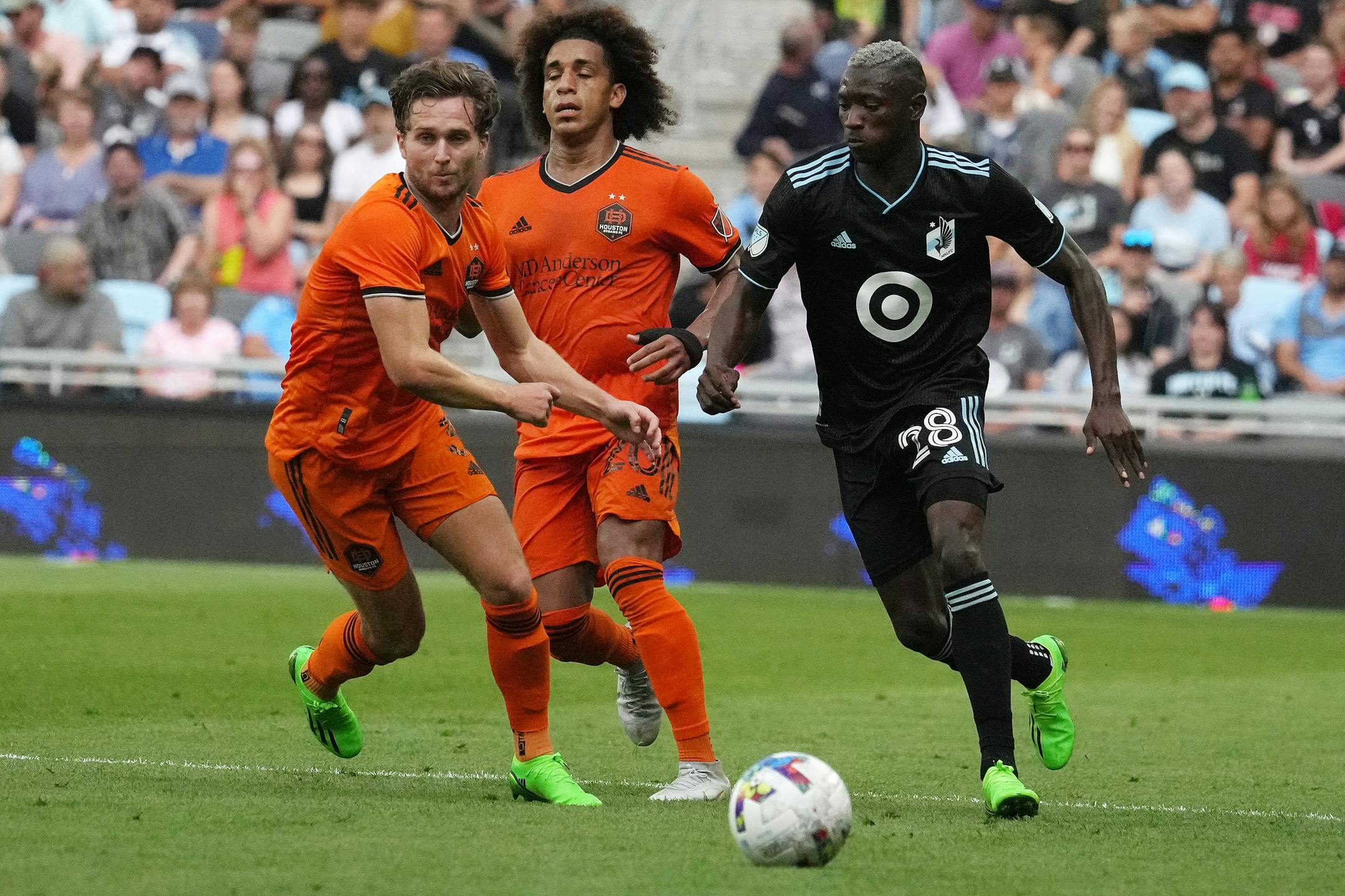 Minnesota United forward Mender Garcia (28) takes the ball up field in the second half of an MLS game between Minnesota United and the Houston Dynamo.