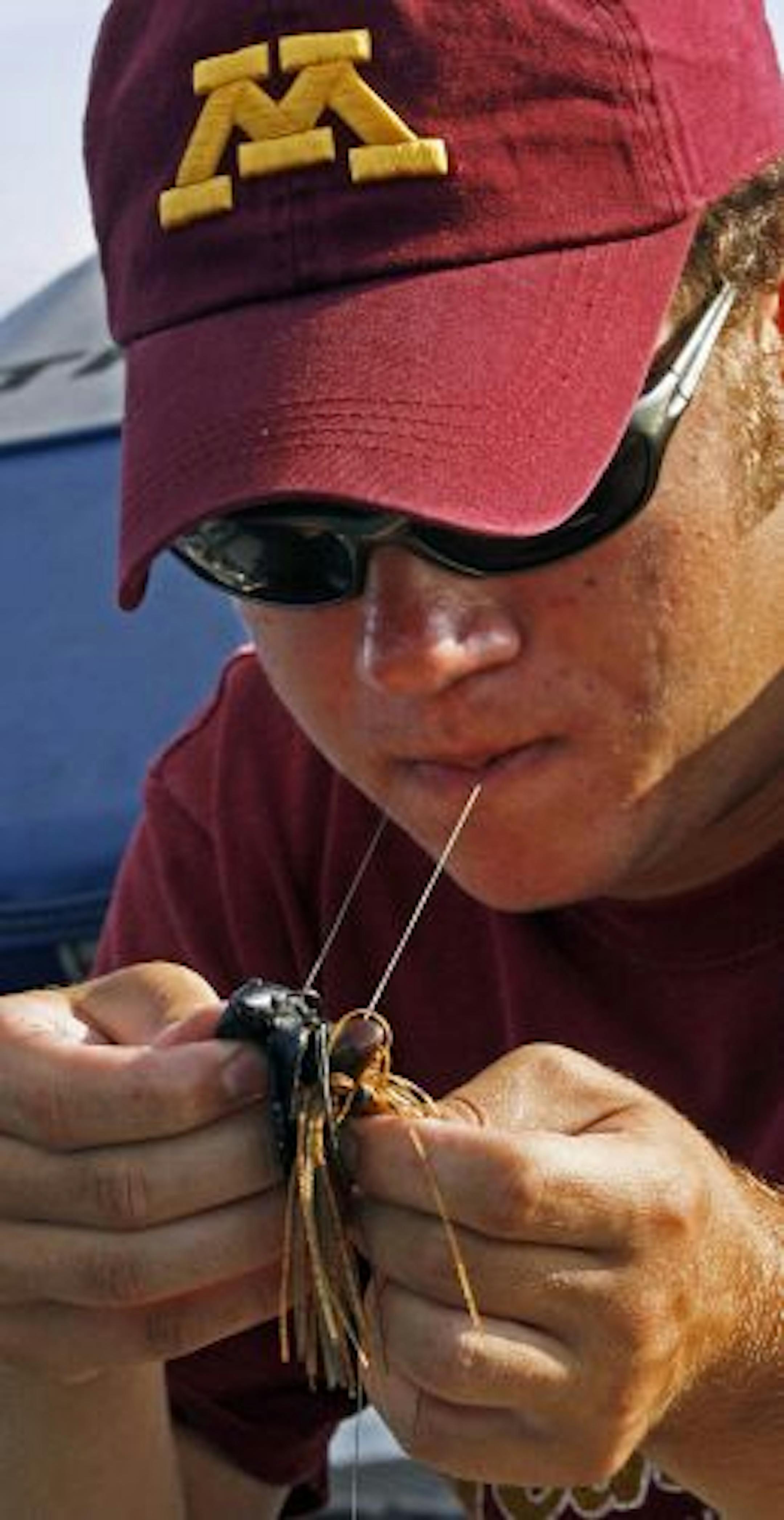 Eric Sanft tied a bass jig onto his line.