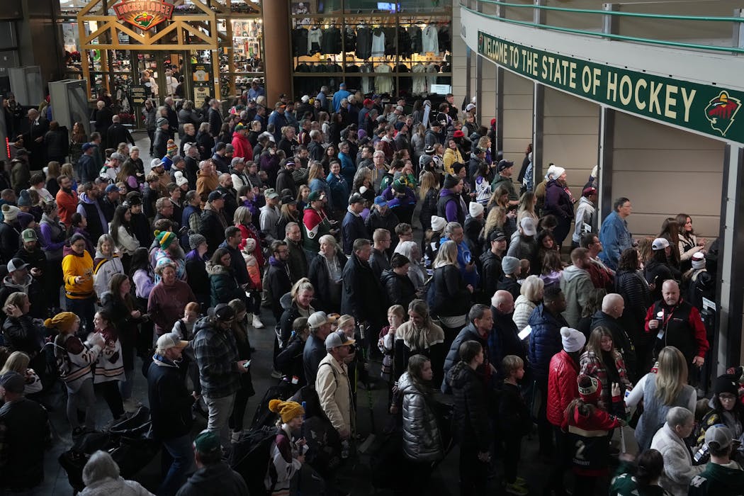 Hockey fans filed into the Xcel Energy Center as the gates opened for the first home game for the Minnesota PWHL team Saturday in St. Paul.