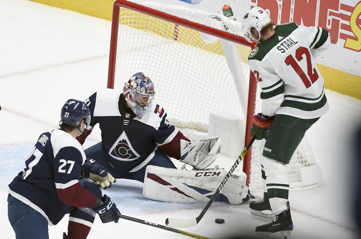 Minnesota Wild center Eric Staal (12) looks to take a shot on Colorado Avalanche goaltender Philipp Grubauer (31) during the third period in an NHL hockey game Saturday, Oct. 5, 2019, in Denver. The Colorado Avalanche defeated the Minnesota Wild 4-2. (AP Photo/John Leyba)