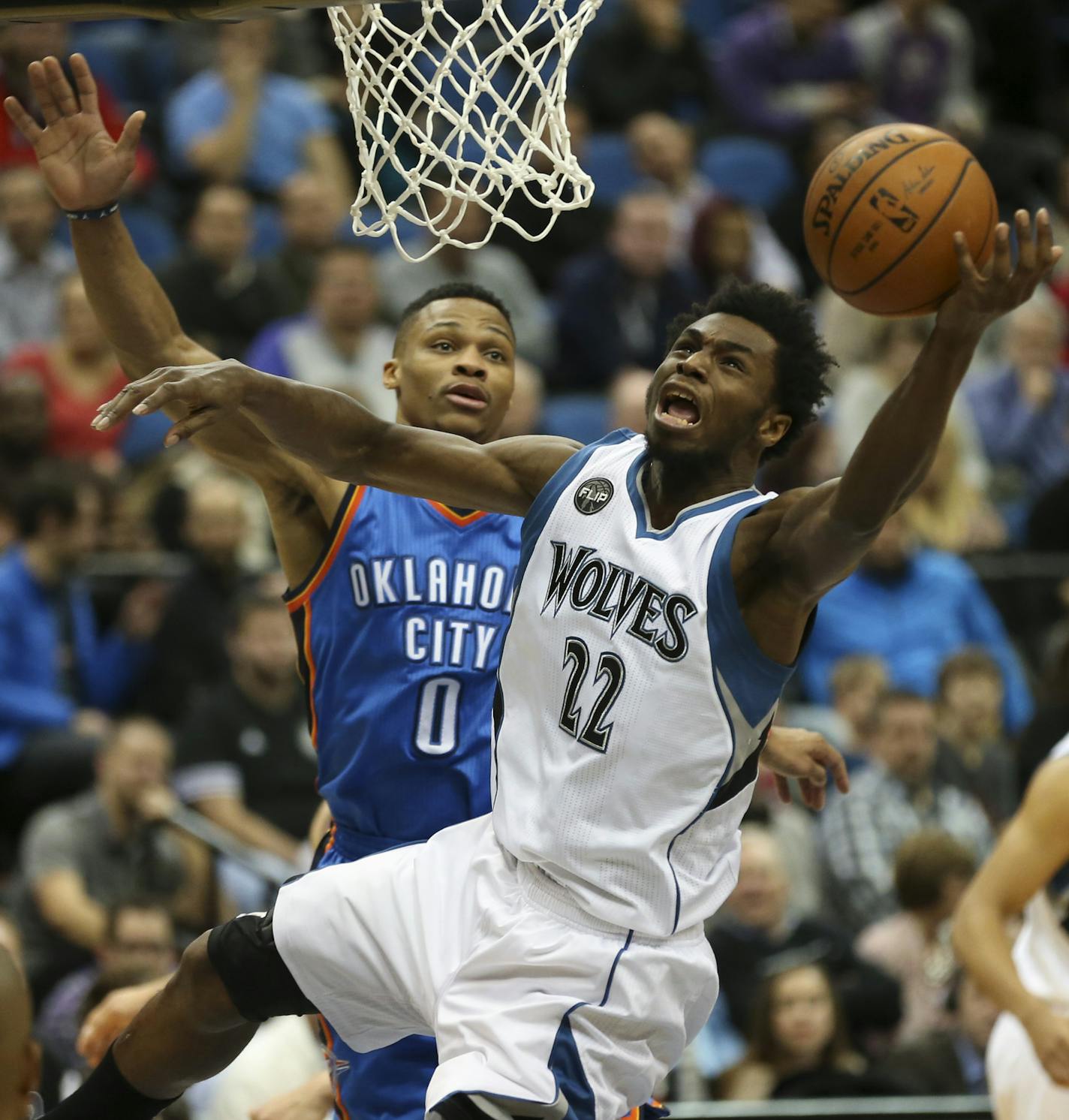 Timberwolves guard Andrew Wiggins (22) was fouled by Oklahoma City Thunder guard Russell Westbrook (0) as he put up a shot in the second half Wednesday night. ] JEFF WHEELER &#xef; jeff.wheeler@startribune.com The Minnesota Timberwolves lost 126-123 to the Oklahoma City Thunder in an NBA game Wednesday night, January 27, 2016 at Target Center in Minneapolis.