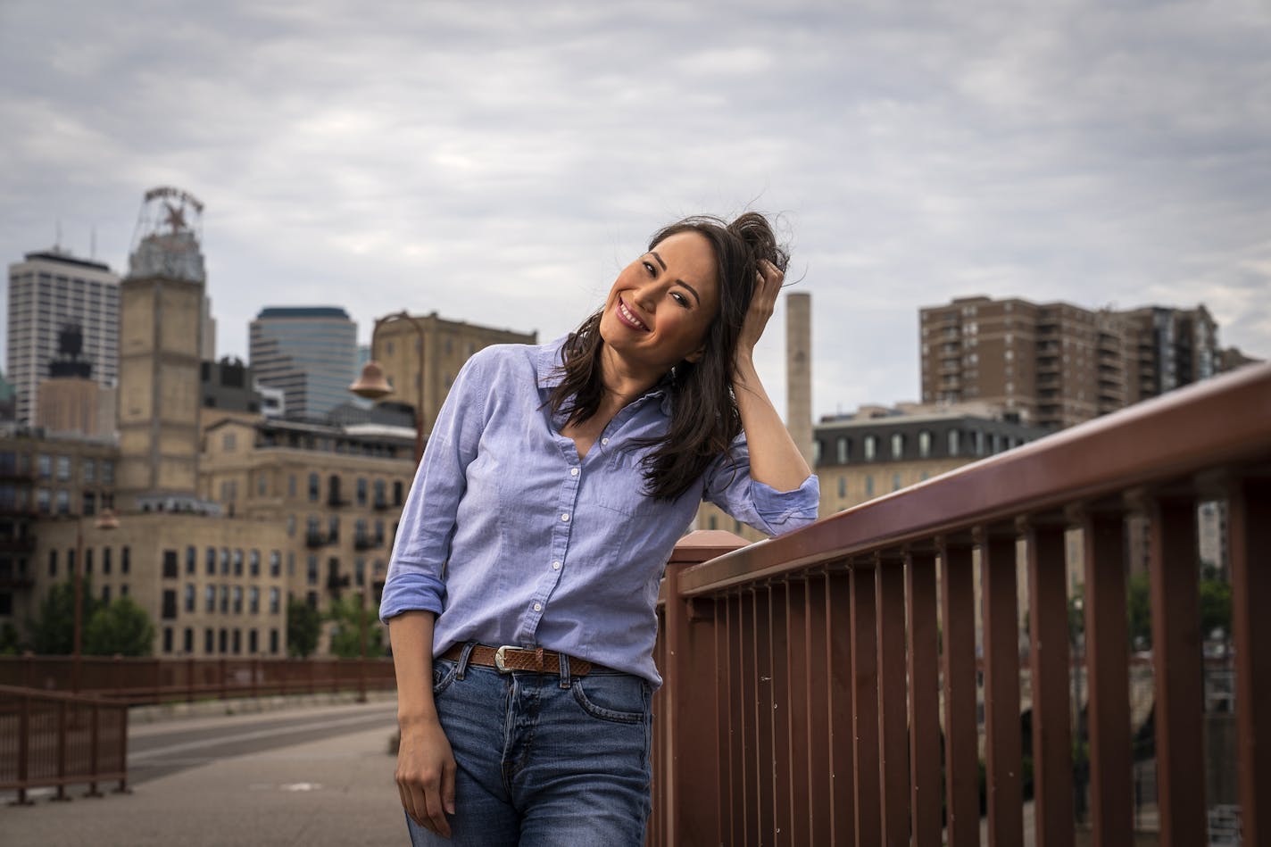 Gia Vang of KARE 11, the first Hmong-American anchor in the Twin Cities, poses for a photo on the Stone Arch Bridge in Minneapolis. ] LEILA NAVIDI &#x2022; leila.navidi@startribune.com BACKGROUND INFORMATION: Gia Vang of KARE 11, the first Hmong-American anchor in the Twin Cities, poses for a photo on the Stone Arch Bridge in Minneapolis on Thursday, July 25, 2019.