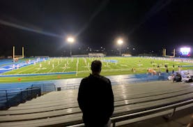 Few fans remained in the stands at St. Thomas Academy on Friday night when the Cadets and Robbinsdale Armstrong returned to the field after a weather 