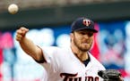 Minnesota Twins starter Phil Hughes fires a pitch during the first inning of their game with the Tampa Bay Rays at Target Field Friday, May 15, 2015, 