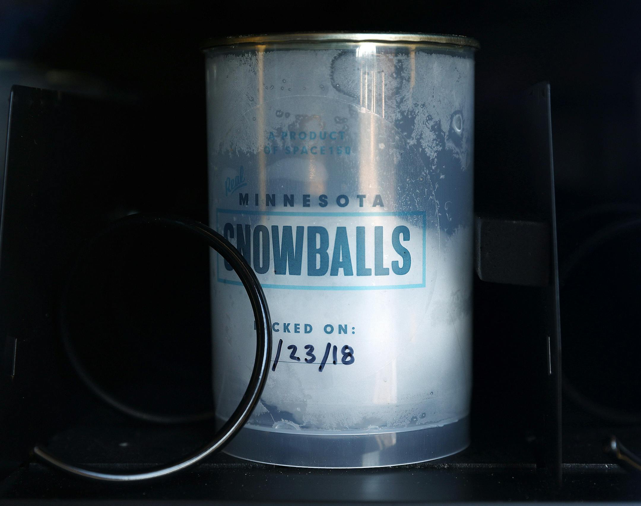 "Real Minnesota snowballs" sat for sale for $1 from a vending machine in the alley behind the Hewing Hotel. ] ANTHONY SOUFFLE &#xef; anthony.souffle@startribune.com The first-ever (known) snowball vending machine - a machine that sells real, hand-packed snowballs to Super Bowl visitors - attracted customers who purchased them for $1 Thursday, Feb. 1, 2018 in the North Loop neighborhood of Minneapolis.