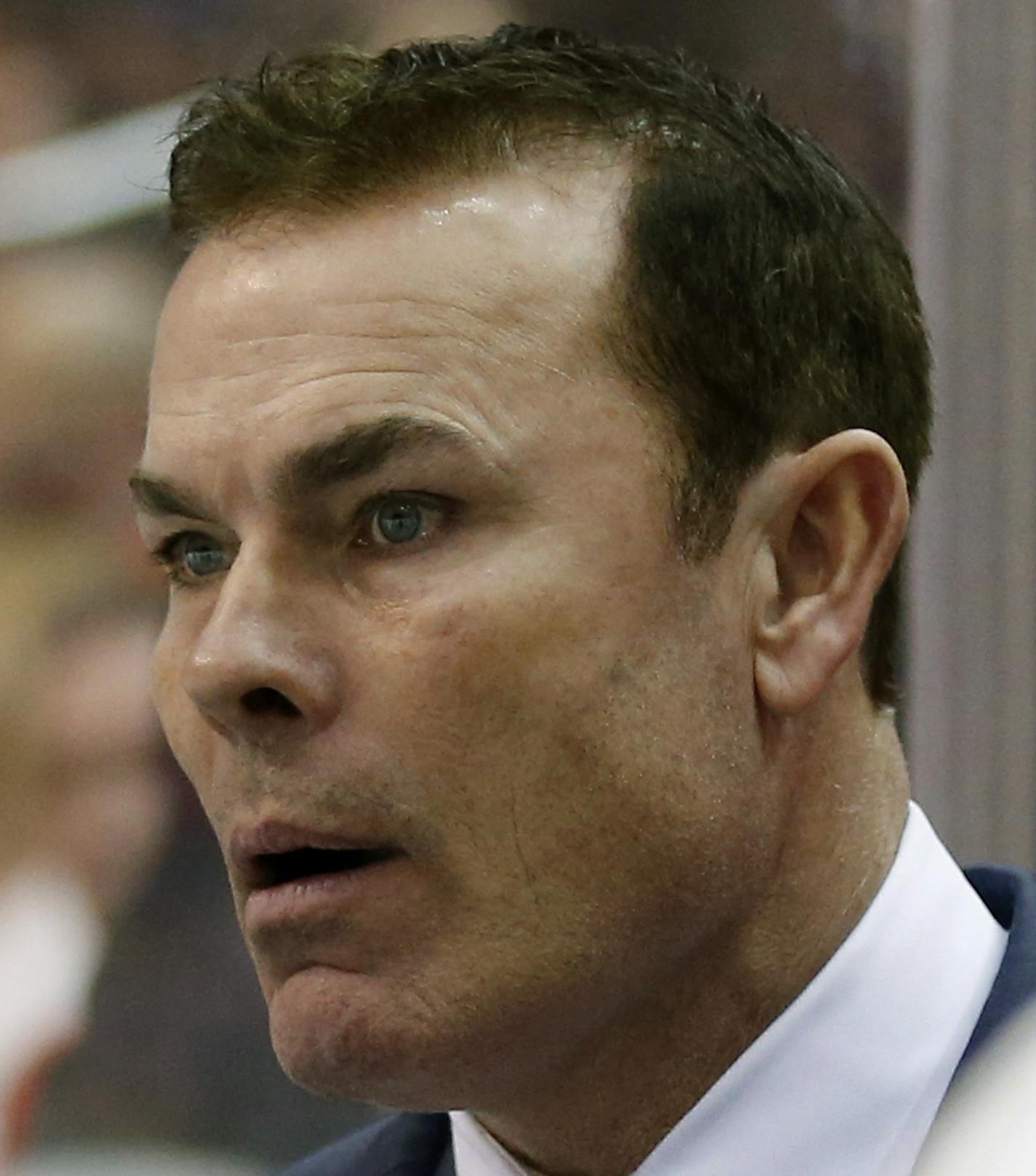 New Jersey Devils coaching staff member Adam Oates, right, stands in the bench area in the third period of an NHL hockey game against the Washington Capitals, Thursday, March 26, 2015, in Washington. The Capitals won 3-2 in overtime. (AP Photo/Alex Brandon) ORG XMIT: VZN10