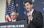 House Speaker Paul Ryan of Wis., joined by House Majority Whip Steve Scalise of La., left, meets with reporters on Capitol Hill in Washington, Tuesday