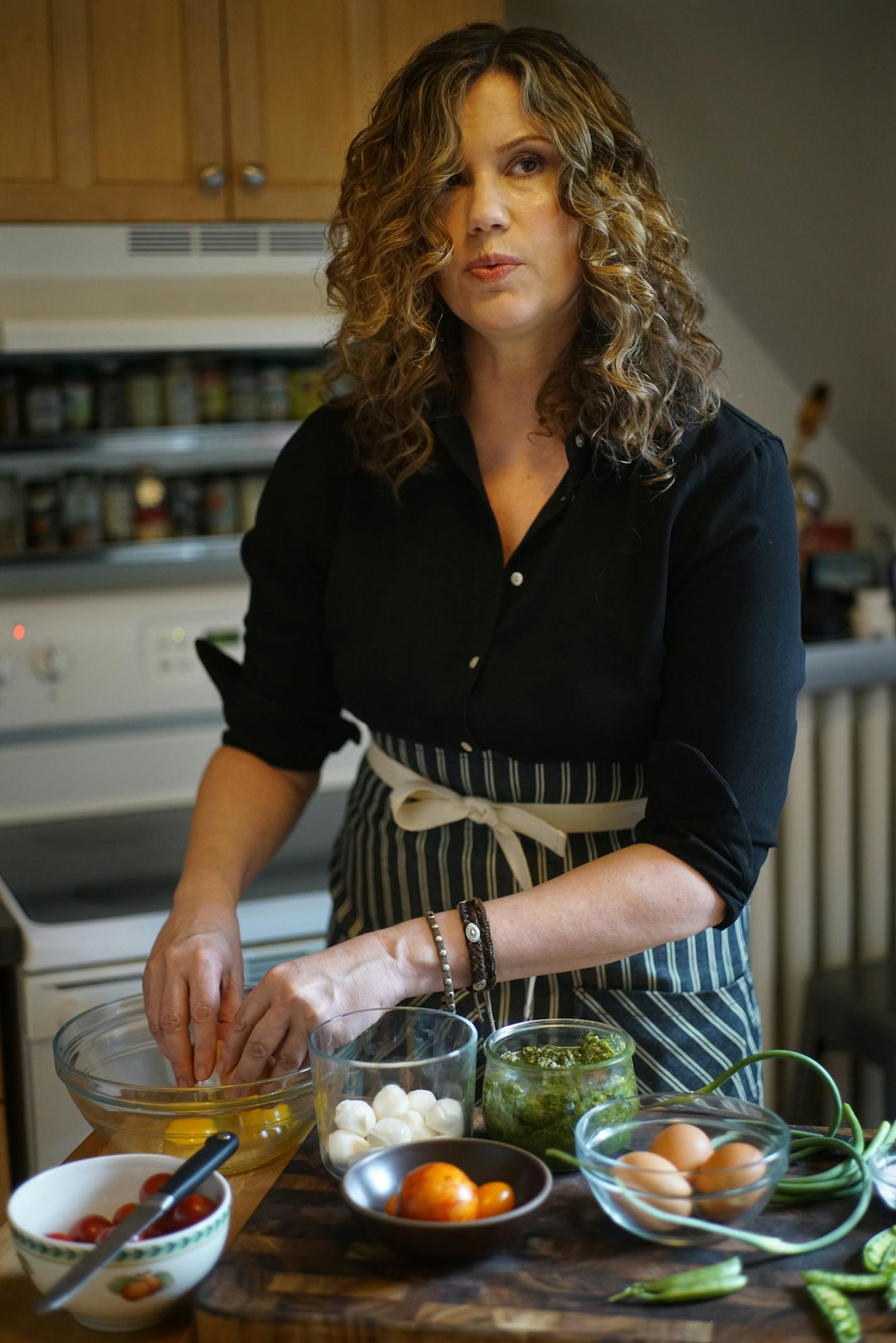 Stephanie A. Meyer prepares an egg frittata with tomatoes, snap peas, pesto, mozzarella, and garlic chives.] When Stephanie A. Meyer writes a grocery list, she's not just planning meals for herself and her boyfriend. She's coming up with a plan that hundreds of people around the world pay to get by email each week. Richard Tsong-Taatarii&#xef;rtsongtaatarii@startribune.com