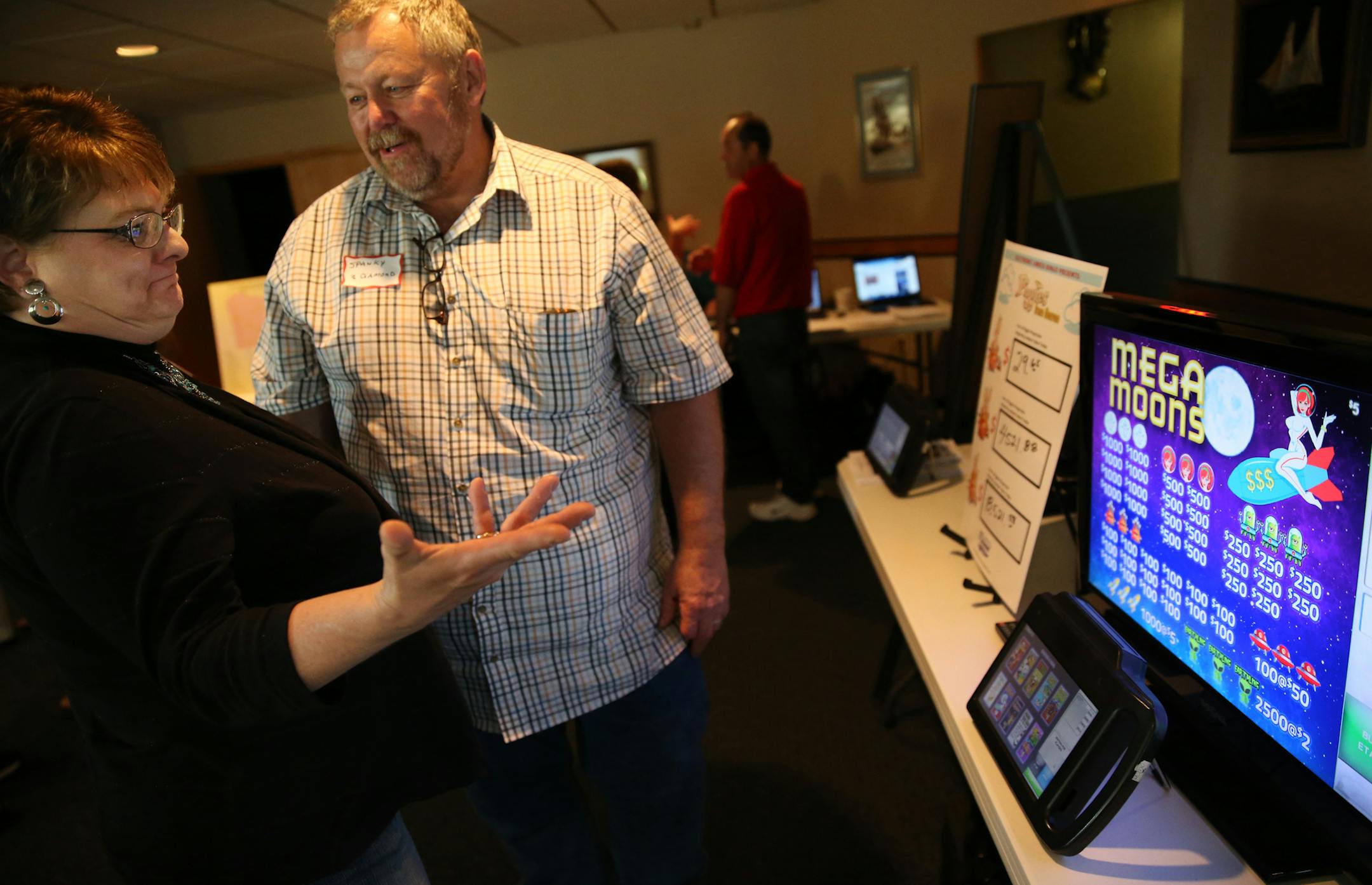 At the Dry Dock Bar in Duluth, Michelle Tomling of Hibbing wanted to try out 3 Diamond’s e-pulltab games because, as a gambling manager for AMVETS Post 12, she is not allowed to play them with her patrons.