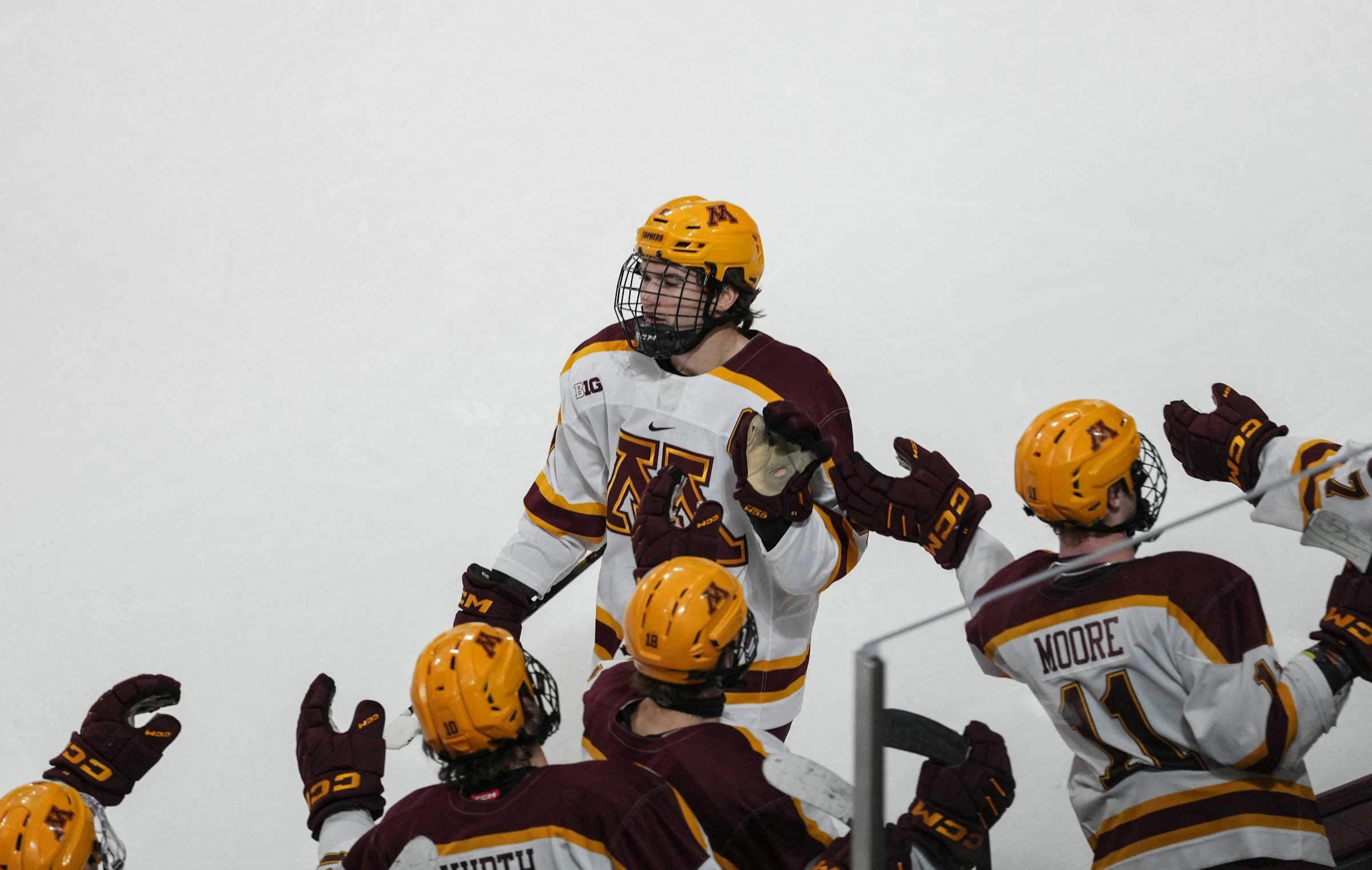 Gophers overcome Wisconsin in overtime to win their eighth straight men's hockey game