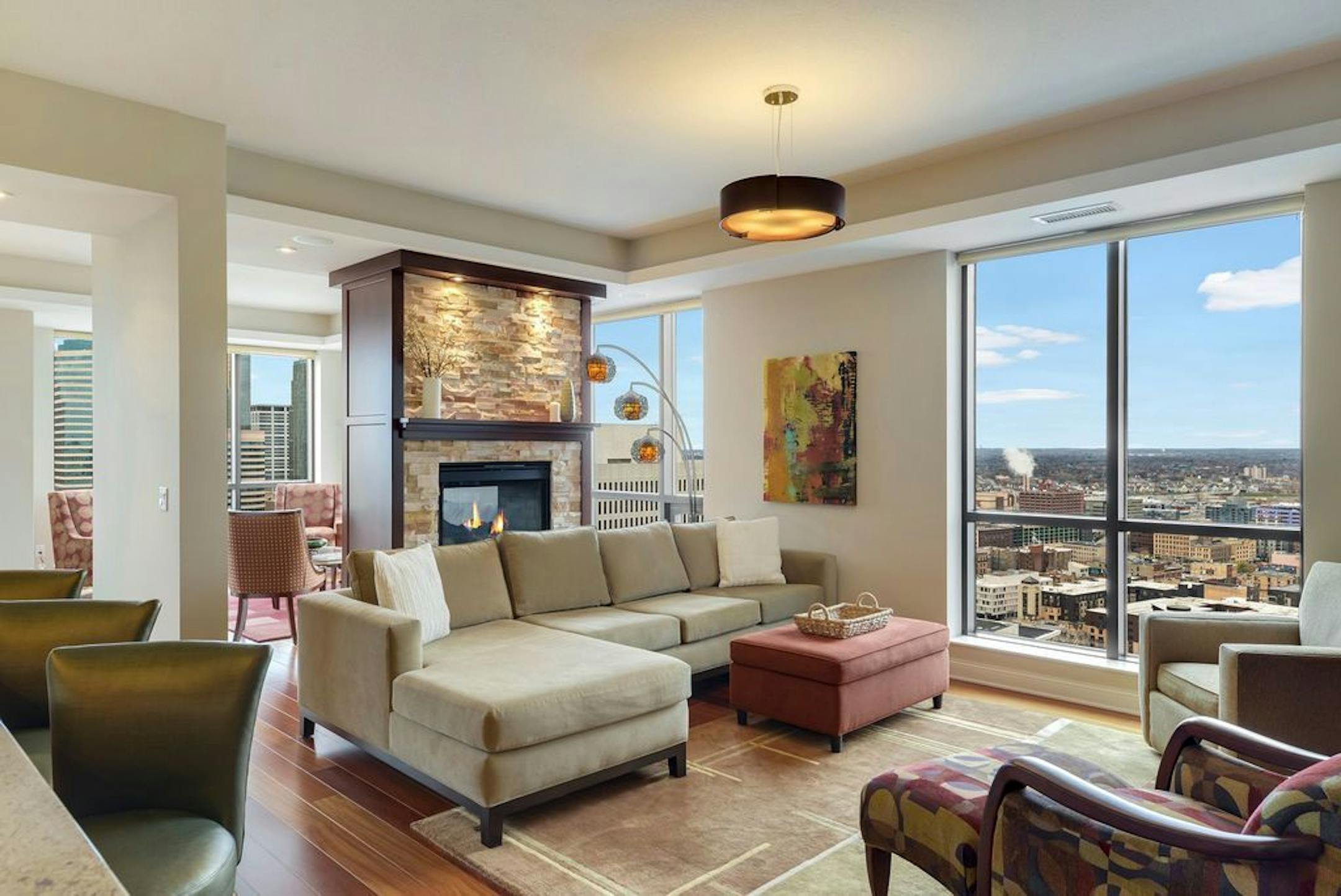 Floor-to-ceiling windows in the corner unit of a $1.875 million condo on the 32nd floor of the Carlyle tower.
