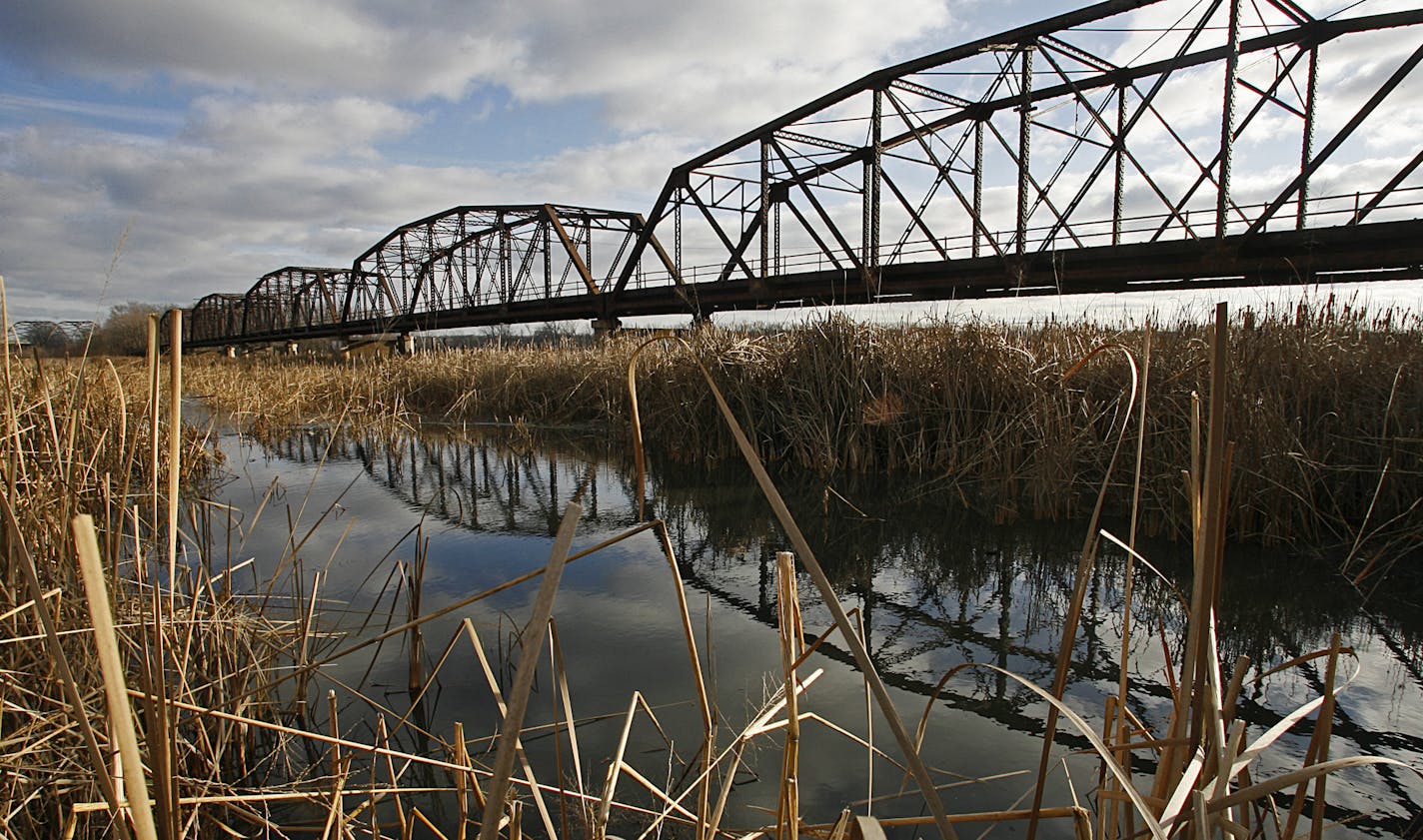 The Old Cedar Avenue bridge crosses the Minnesota Valley National Wildlife Refuge.