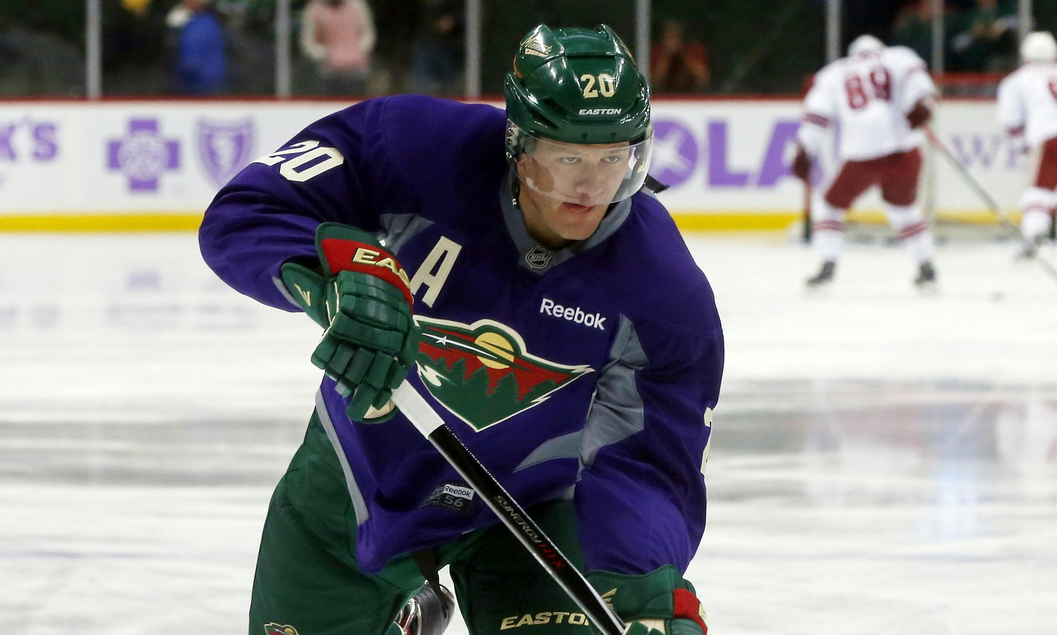 Minnesota Wild defenseman Ryan Suter warms up prior to an NHL hockey game against the Arizona Coyotes, Thursday, Oct. 23, 2014, in St. Paul, Minn. (AP Photo/Jim Mone) ORG XMIT: MNJM10