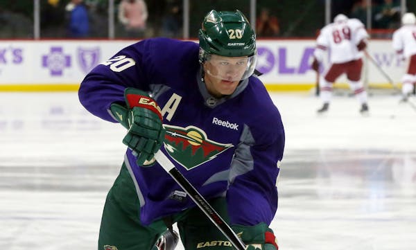 Minnesota Wild defenseman Ryan Suter warms up prior to an NHL hockey game against the Arizona Coyotes, Thursday, Oct. 23, 2014, in St. Paul, Minn. (AP
