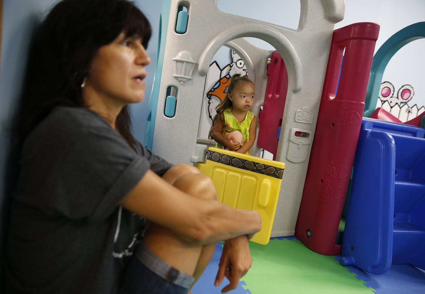 GiGi's Playhouse is a support network, play group, and educational facility for children with Down syndrome in St. Louis Park. Teri Palthen enjoys bringing her daughter Ava,3, for an open group playtime.]tsong-taataarii@startribune.com