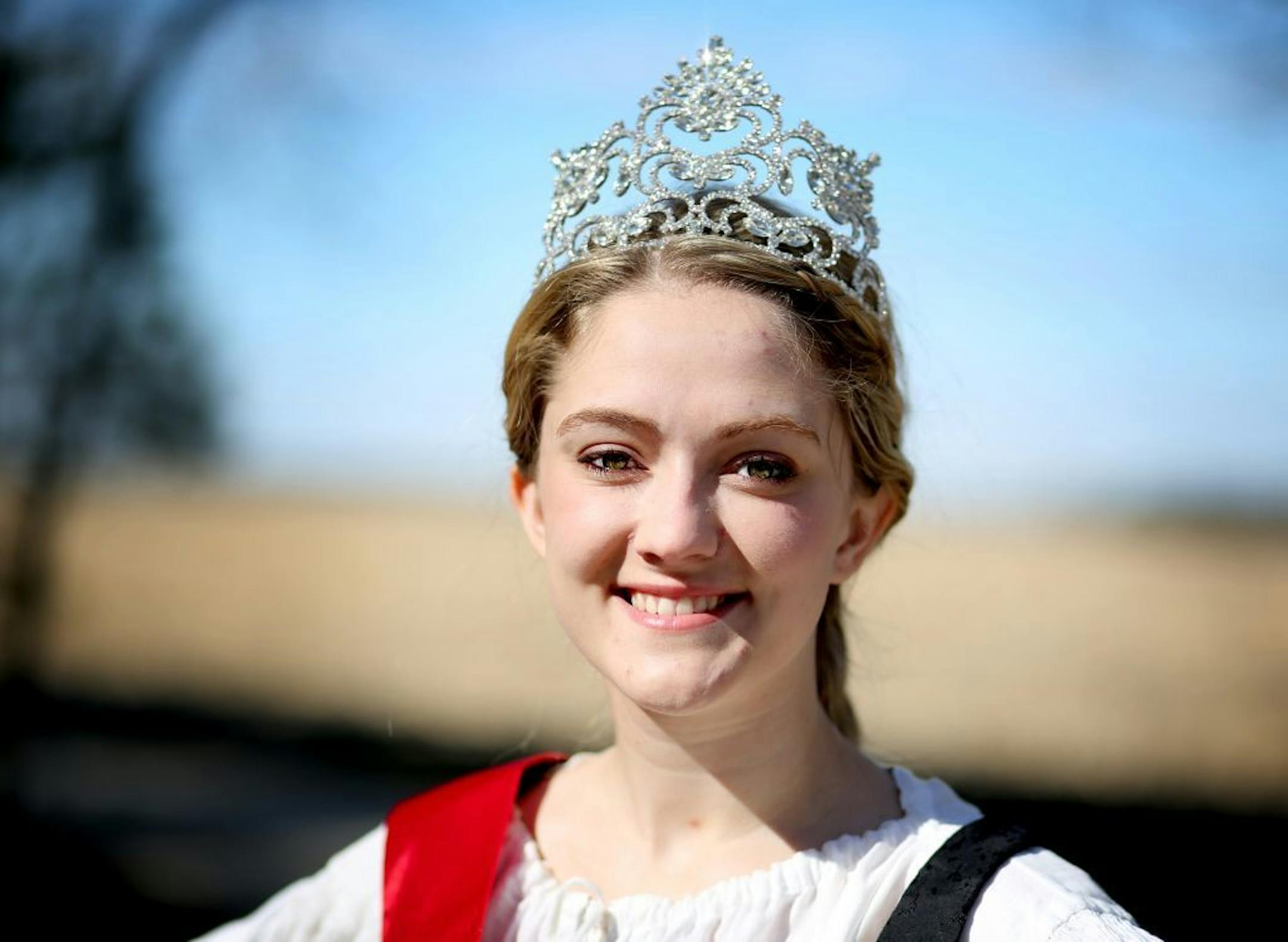 Miss Czech Slovak pageant winner Alexa Turgeon, 21, a Minnesota State Mankato University student, poses for a photo outside her family's home wearing a kroj, a traditional Bohemian dress, Wednesday, April 12, 2016 in Lonsdale, MN.