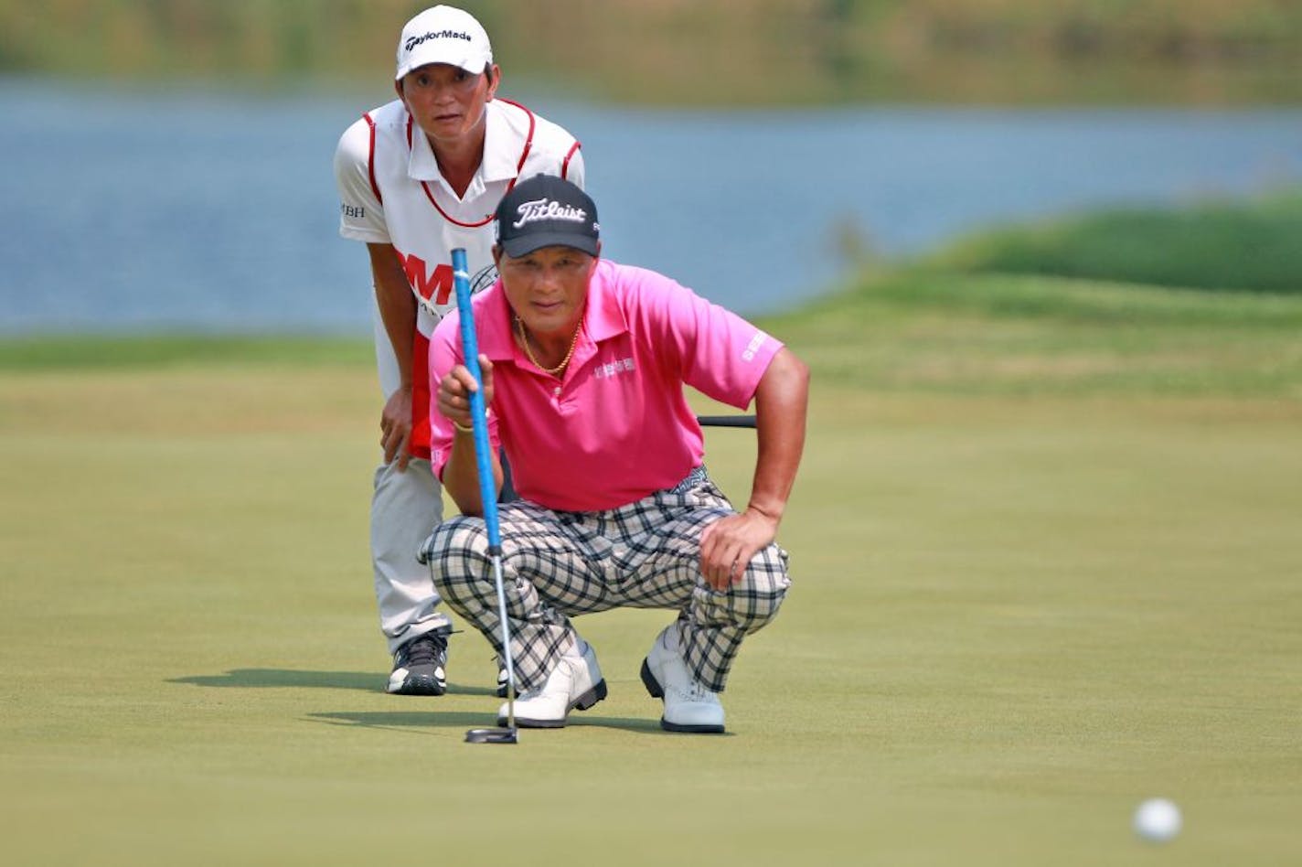 Chien Soon Lu lined up his putt on the seventh hole during the first round of the 3M Championship on Friday. Lu was in a four-way tie for the lead.