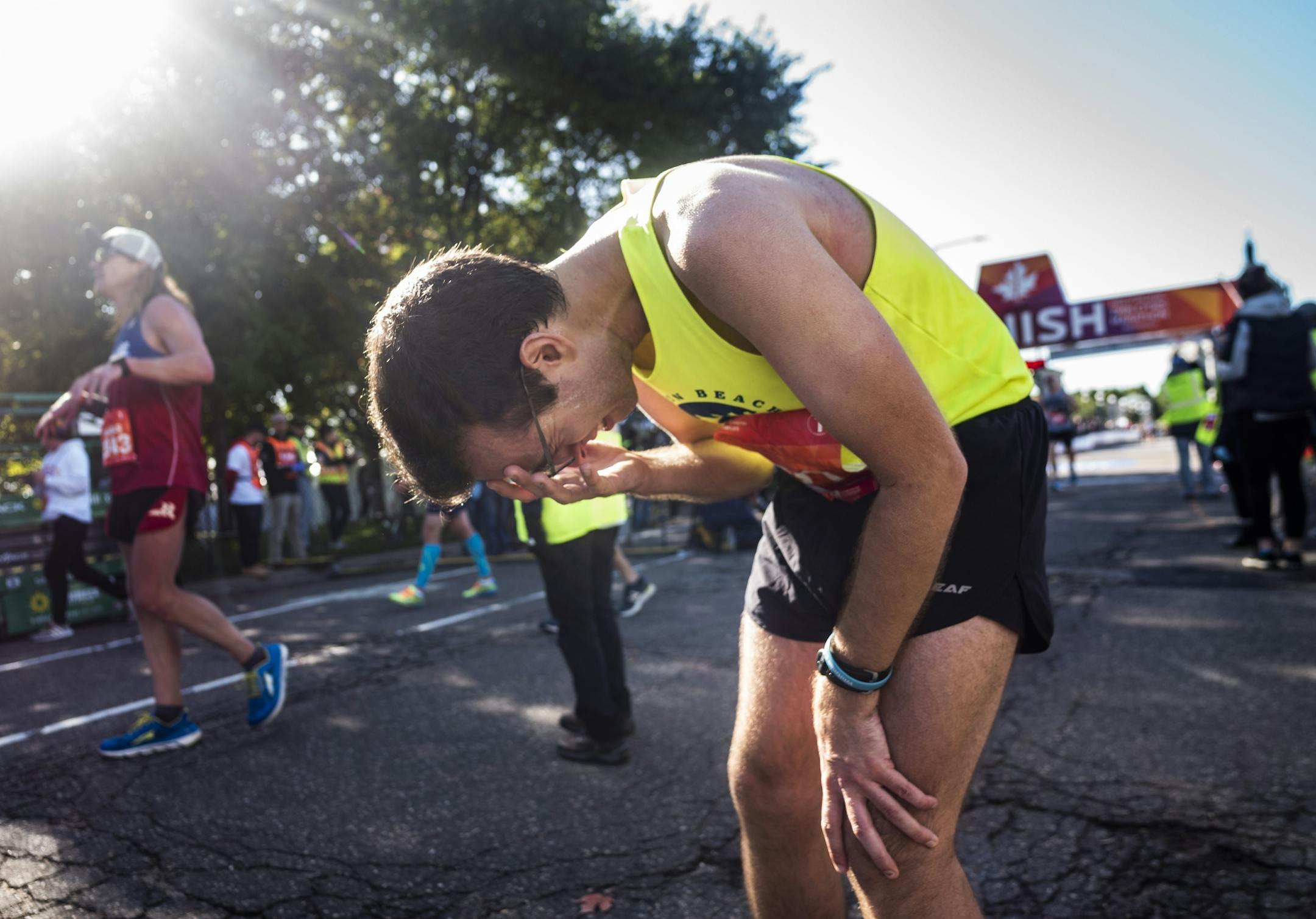 Alex Waheed of Minneapolis became emotional after finishing the race in 2:56:17.
