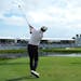 Austin Eckroat hits from the 17th tee during the final round of the Cognizant Classic in Palm Beach Gardens, Fla., on Monday. Eckroat got the first vi