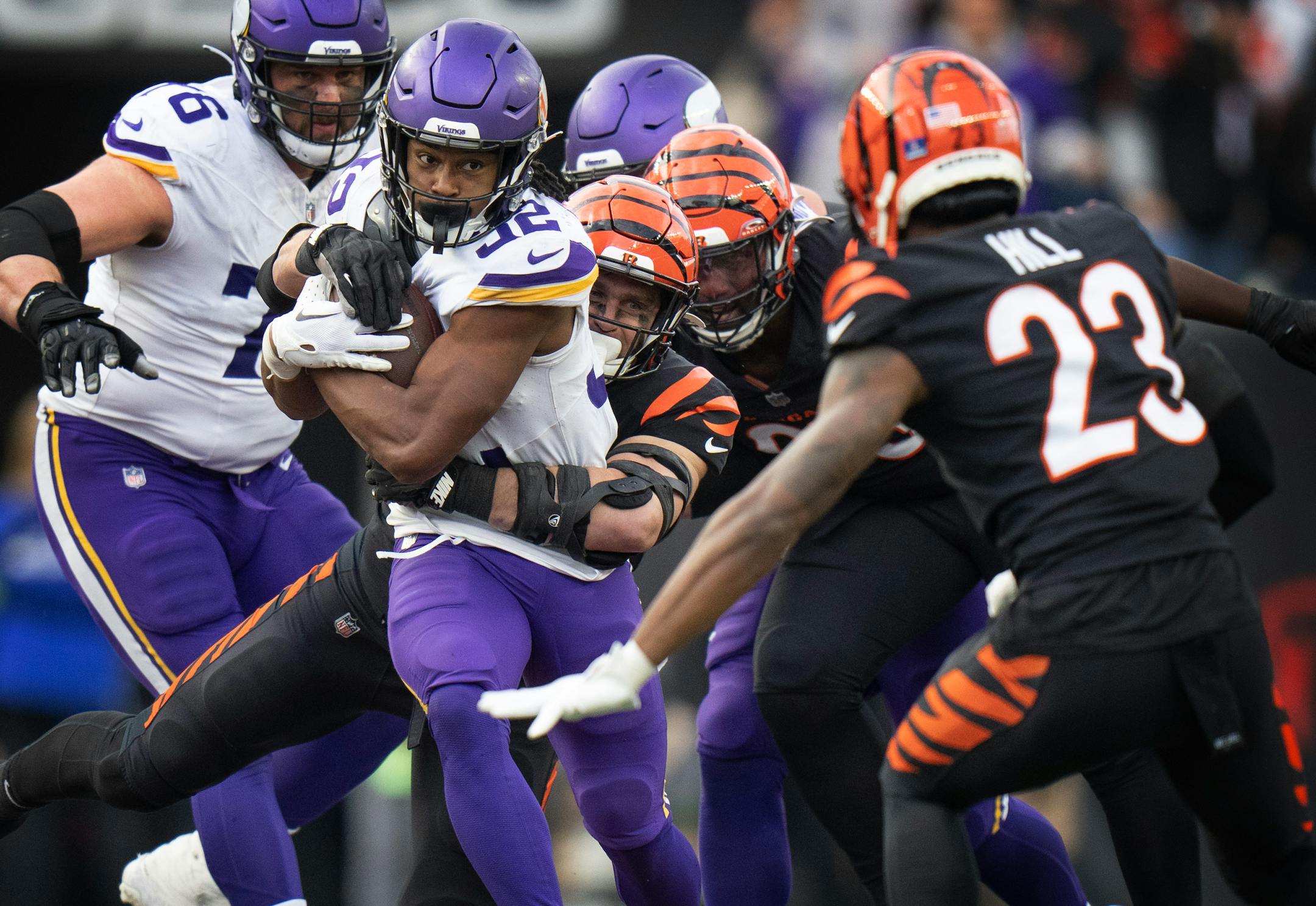 Minnesota Vikings running back Ty Chandler (32) picks up a first down the fourth quarter Saturday December ,16 ,2023 in,Cincinnati, OH. ] JERRY HOLT • jerry.holt@startribune.com