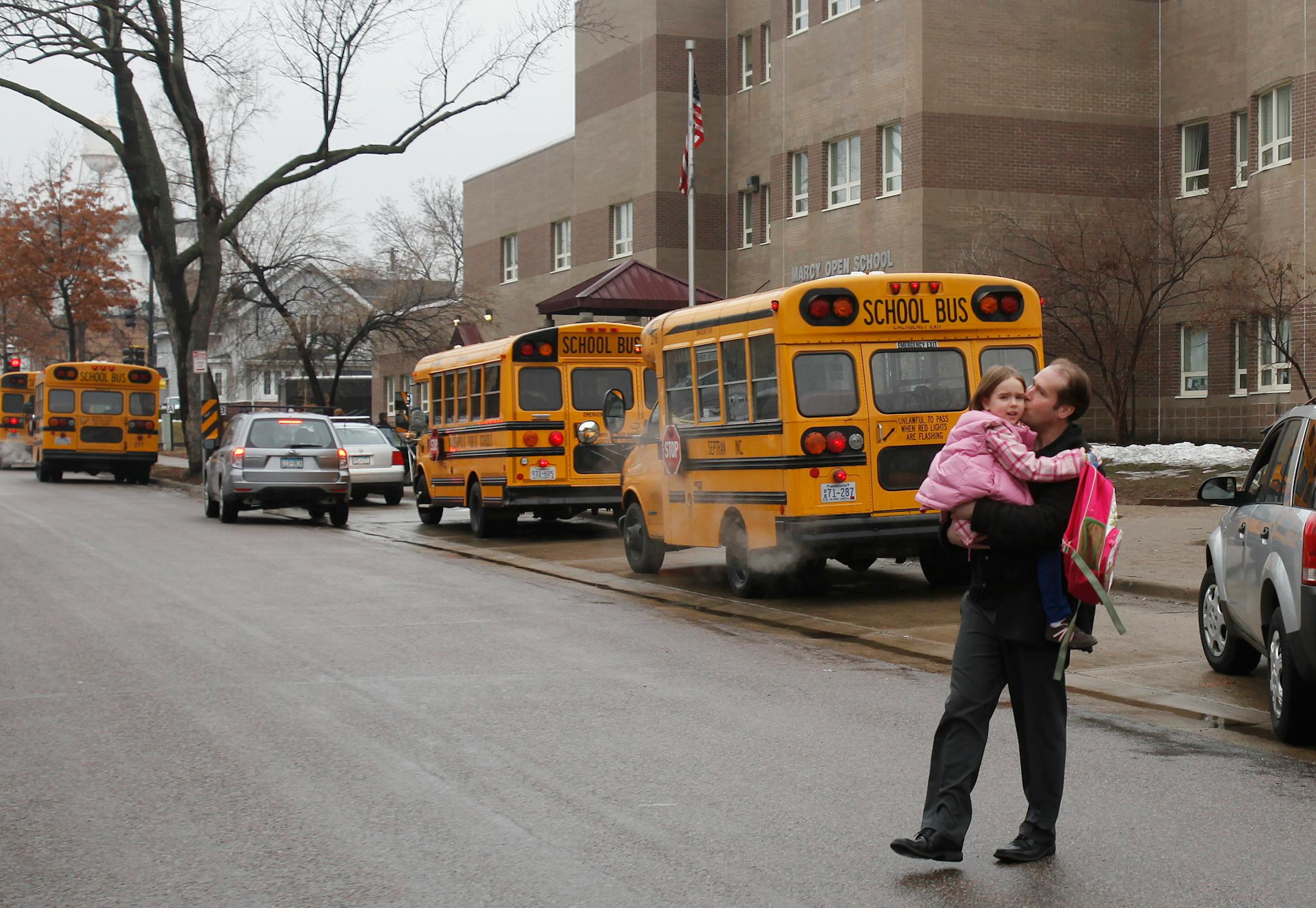 Eden Gartner greeted his daughter at Marcy Open School at the end of the school day, following the lockdown Wednesday at all Minneapolis Schools.