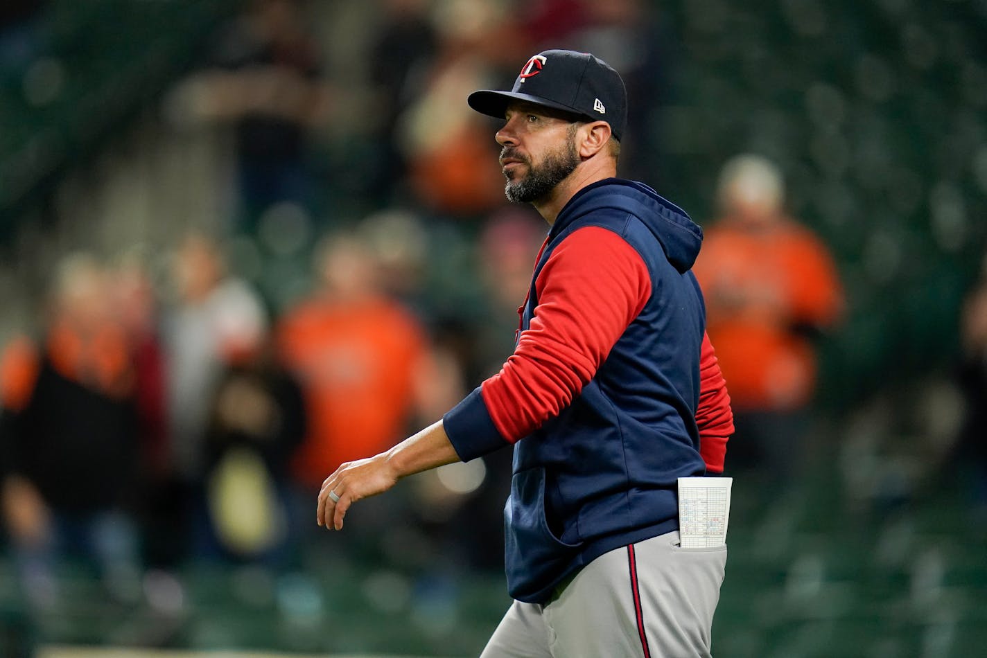 Minnesota Twins bench coach Jayce Tingler heads to the mound to pull relief pitcher Jhoan Duran for another reliever during the eighth inning of a baseball game against the Baltimore Orioles, Thursday, May 5, 2022, in Baltimore. The Orioles won 5-3. (AP Photo/Julio Cortez)