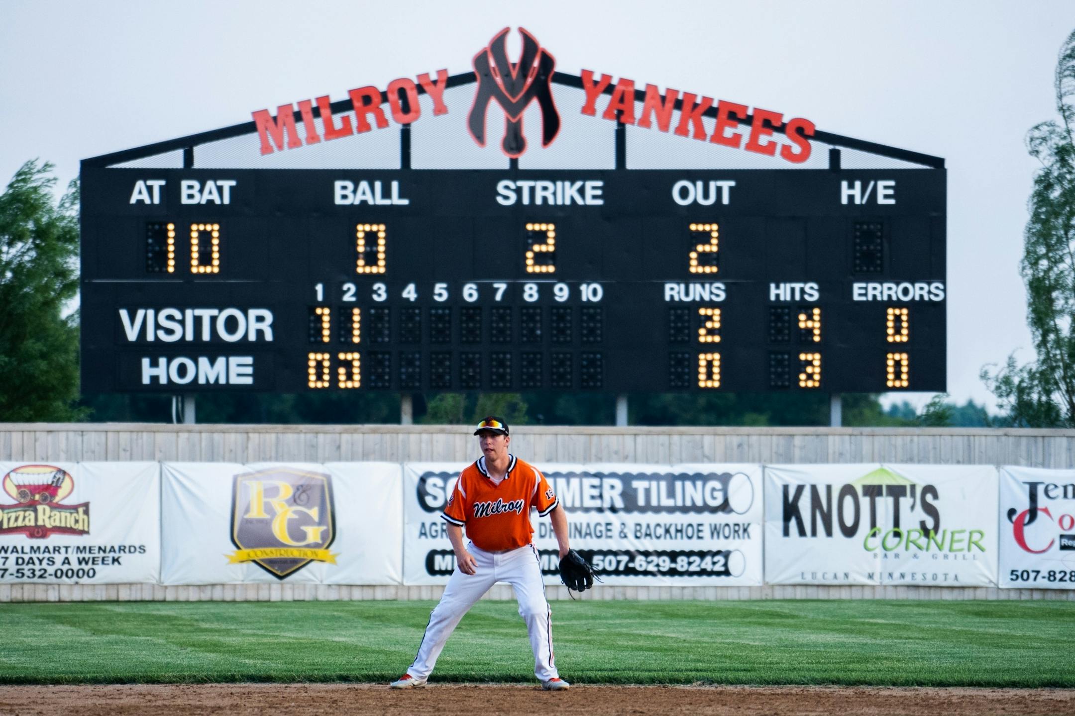Yankees' Aaron Mathiowetz moves toward the infield during a play against Spicer at Yankee Field.