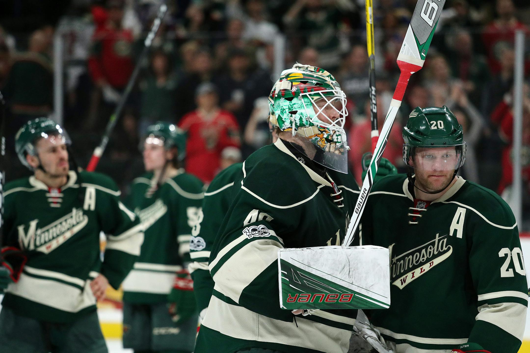 Minnesota Wild defenseman Ryan Suter (20) hugged Minnesota Wild goalie Devan Dubnyk (40) after their loss in overtime. ] ANTHONY SOUFFLE &#xef; anthony.souffle@startribune.com Game action from a National Hockey League (NHL) playoff game 5 between the Minnesota Wild and the St. Louis Blues Saturday, April 22, 2017 at the Xcel Energy Center in St. Paul, Minn.