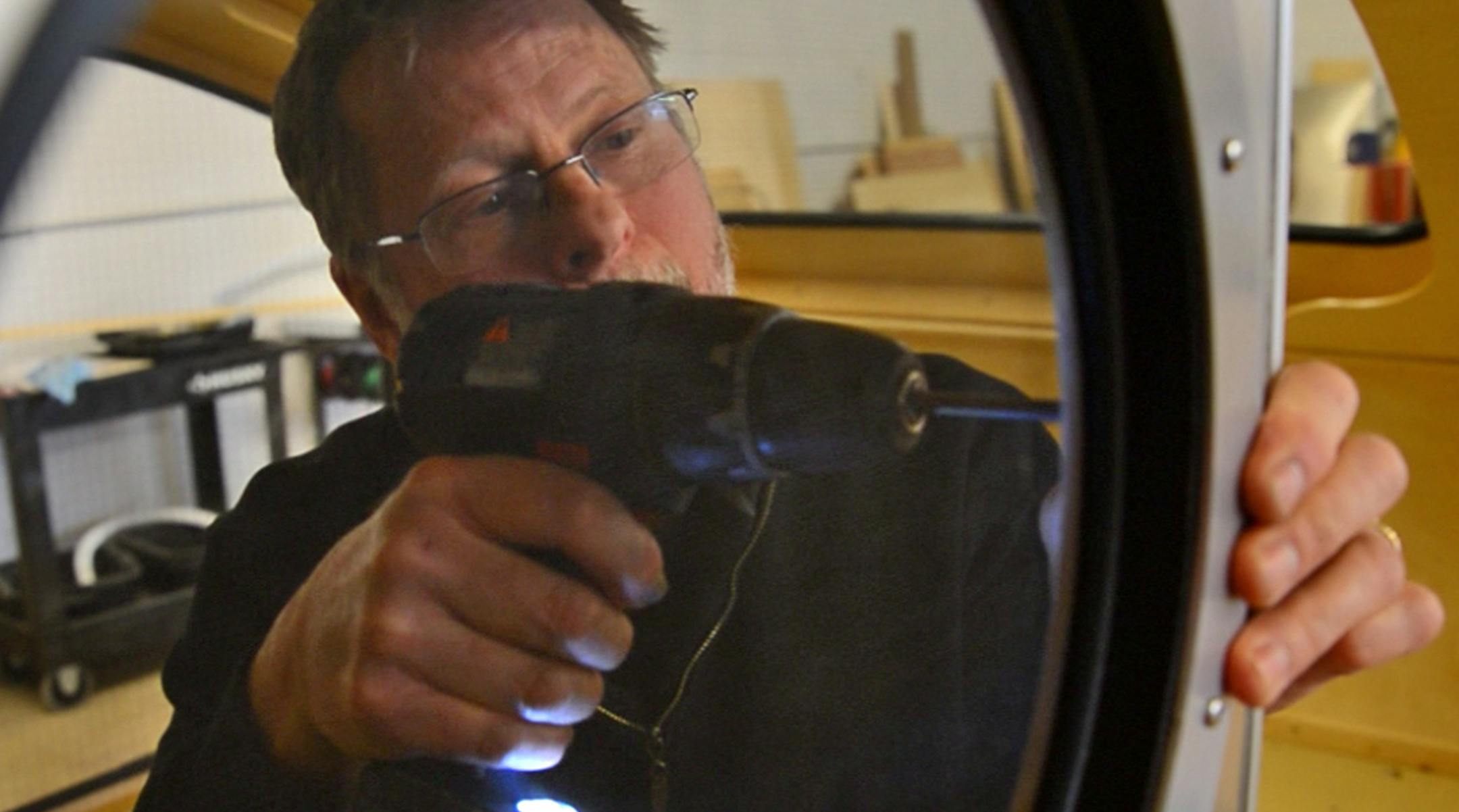 Bert Taylor started building tiny, tear-drop shaped RV trailers last year. Now he can't make enough to keep up with demand. The trailers have a kitchenette and a queen sized bed. He worked on installing a portal screen ] Richard.Sennott@startribune.com Richard Sennott/Star Tribune Minneapolis , Minn. Tuesday 2/4/2014) ** (cq)
