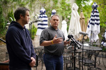 State Rep. Dave Baker, right, teamed up with Michael Asp, owner of La Grolla restaurant to talk Thursday about the hardships that eateries face by fol