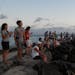 311 – Sunset at Waikiki Beach draws crowds to the jetty for photographs and a moment of reflection at day's end.