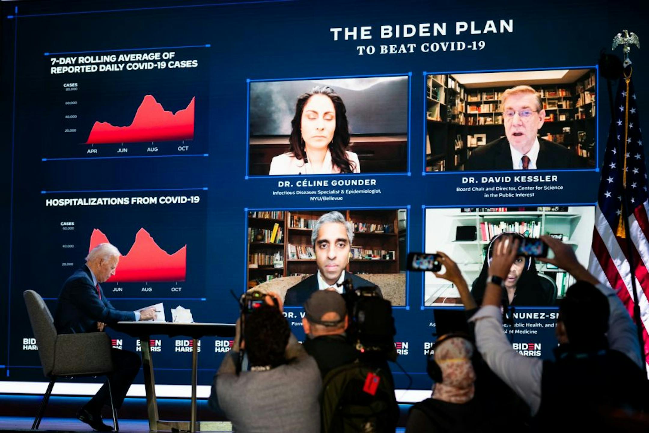 With members of the media looking on, Joe Biden participated in a briefing with his advisors on the coronavirus pandemic, at the Queen in Wilmington, Del. Oct. 28, 2020.