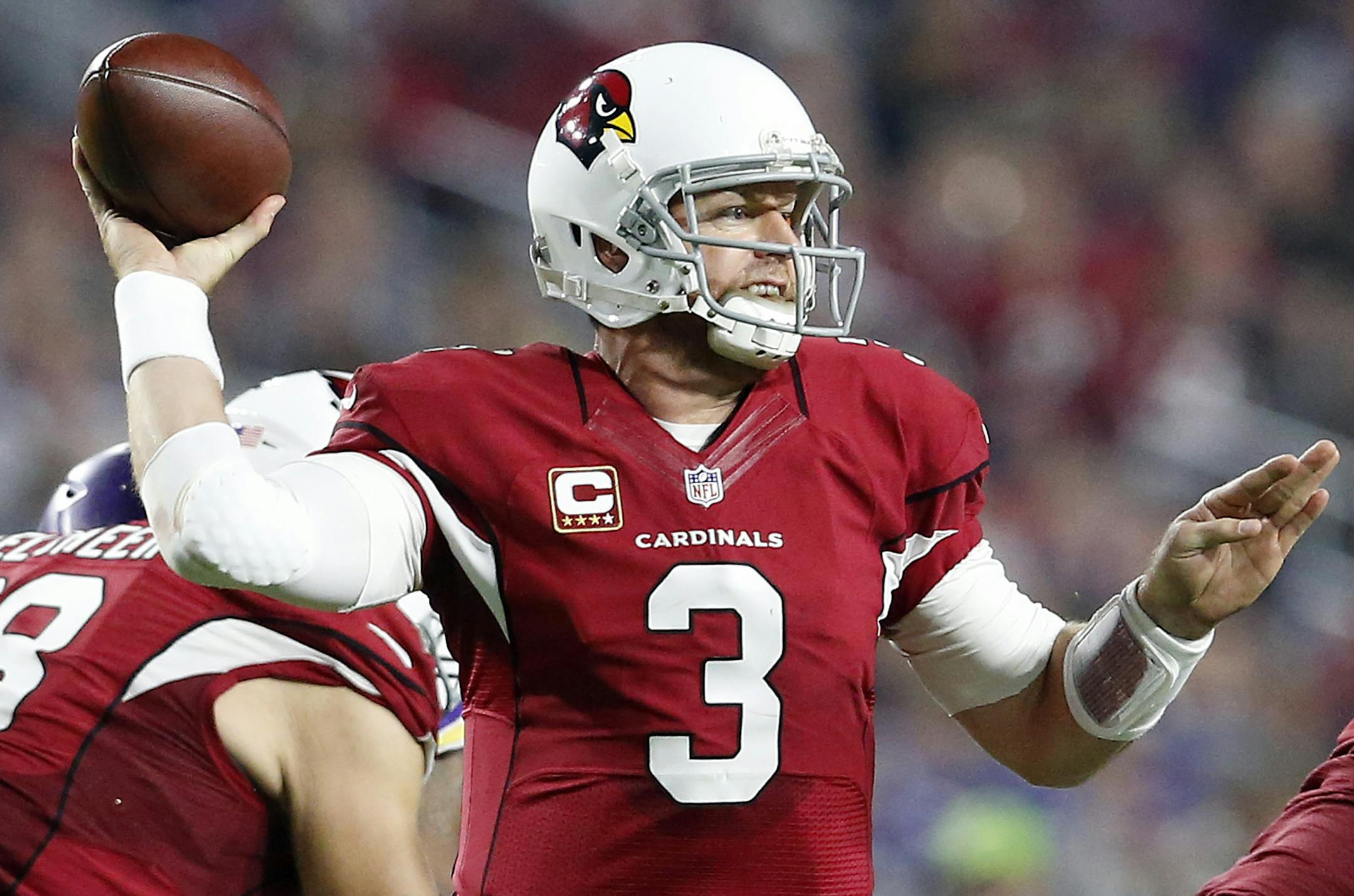 Carson Palmer (3) attempted a pass in the third quarter.