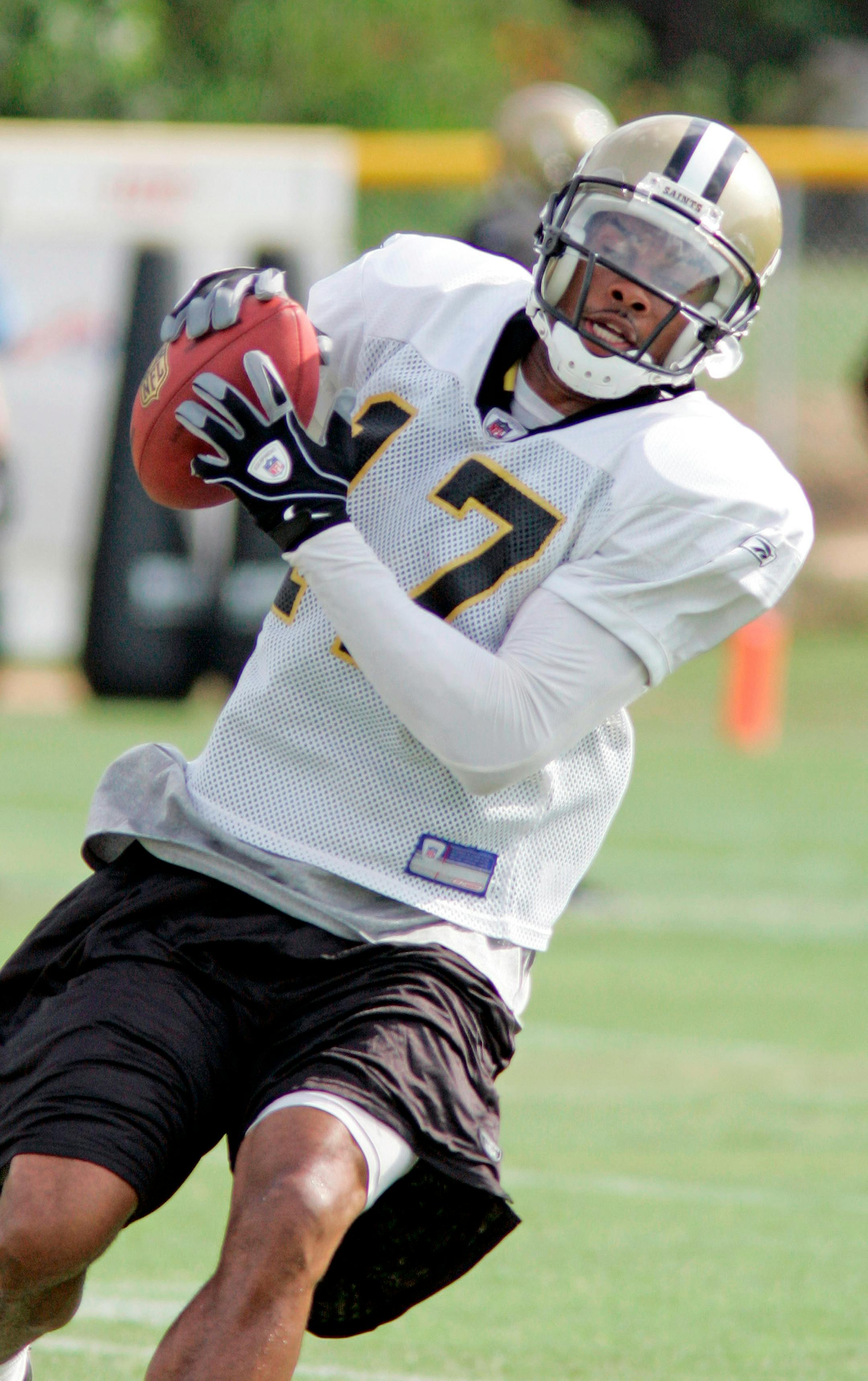 In this July 26, 2008 photo New Orleans Saints wide receiver Robert Meachem catches a pass during practice at football training camp in Jackson, Miss.